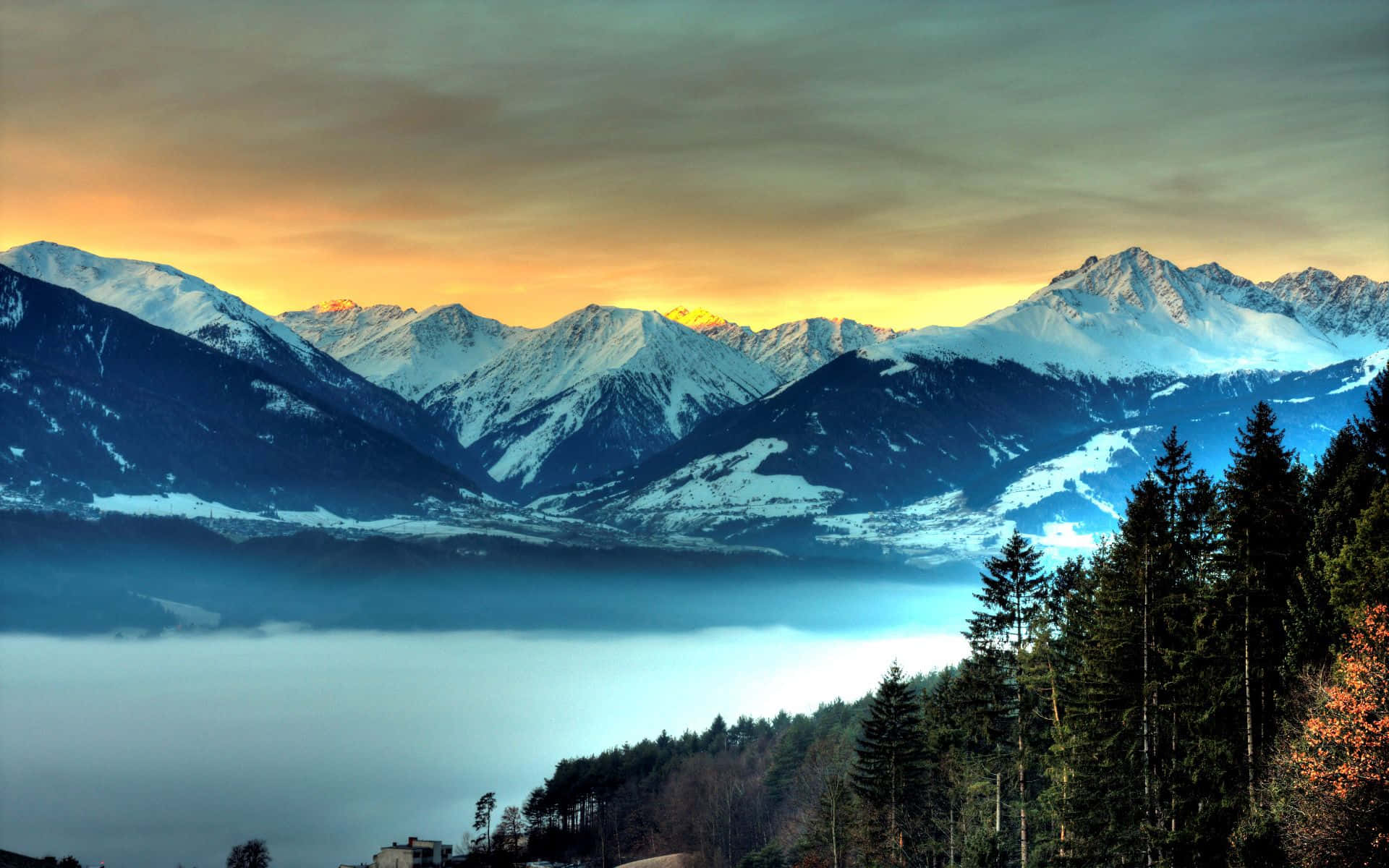 Download Snowy Mountain Landscape And Foggy Lake Wallpaper