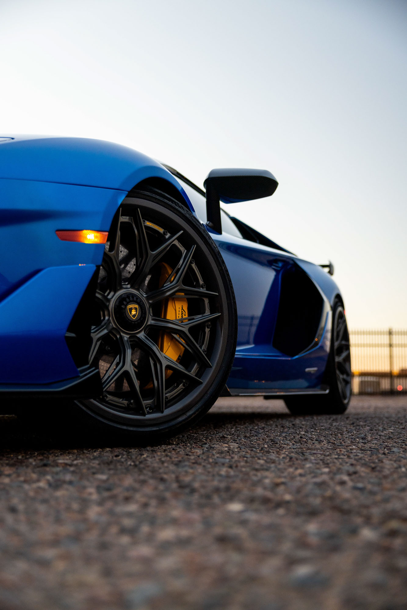 Blue Lamborghini Aventador SVJ with a