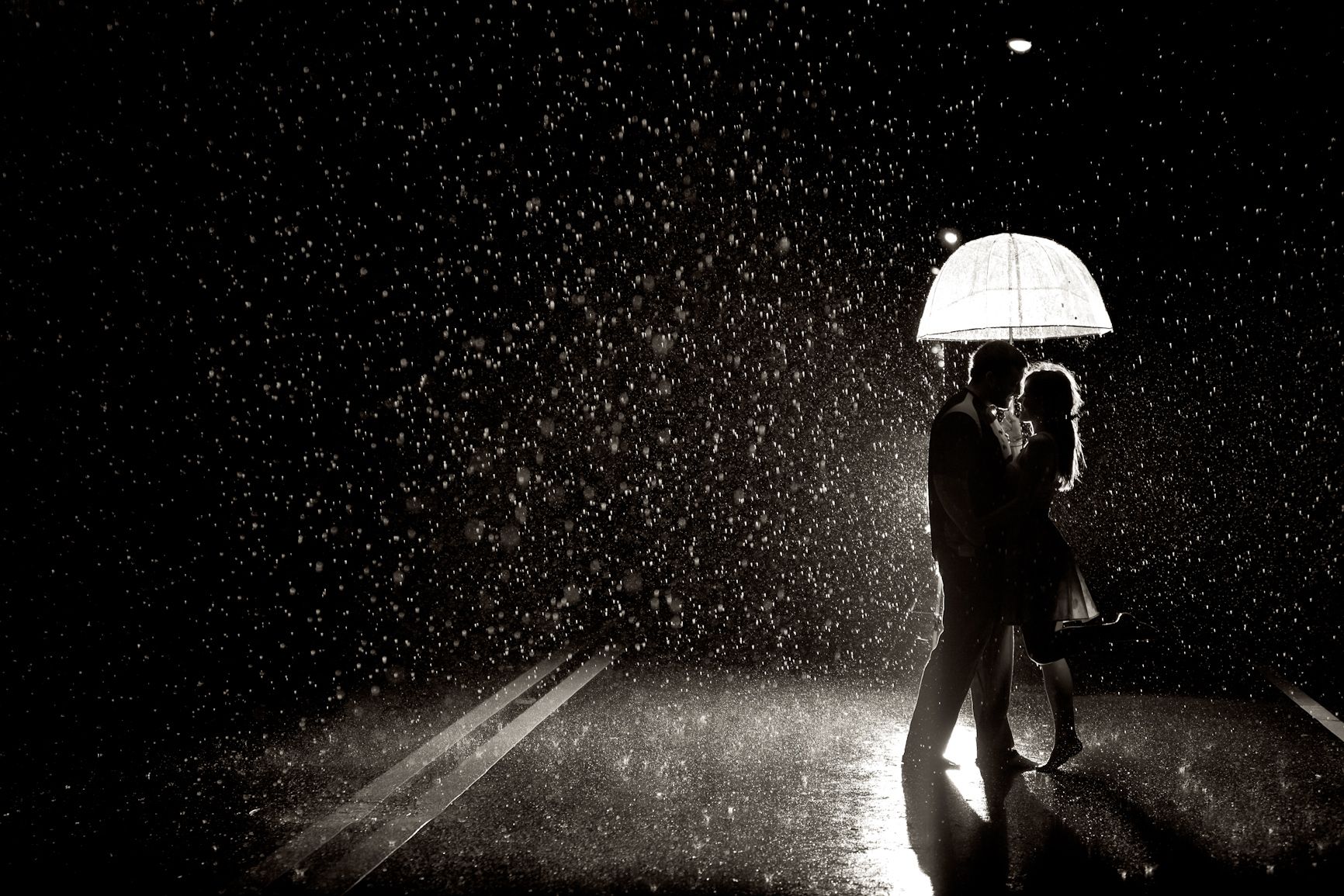 Couples Dancing In The Rain