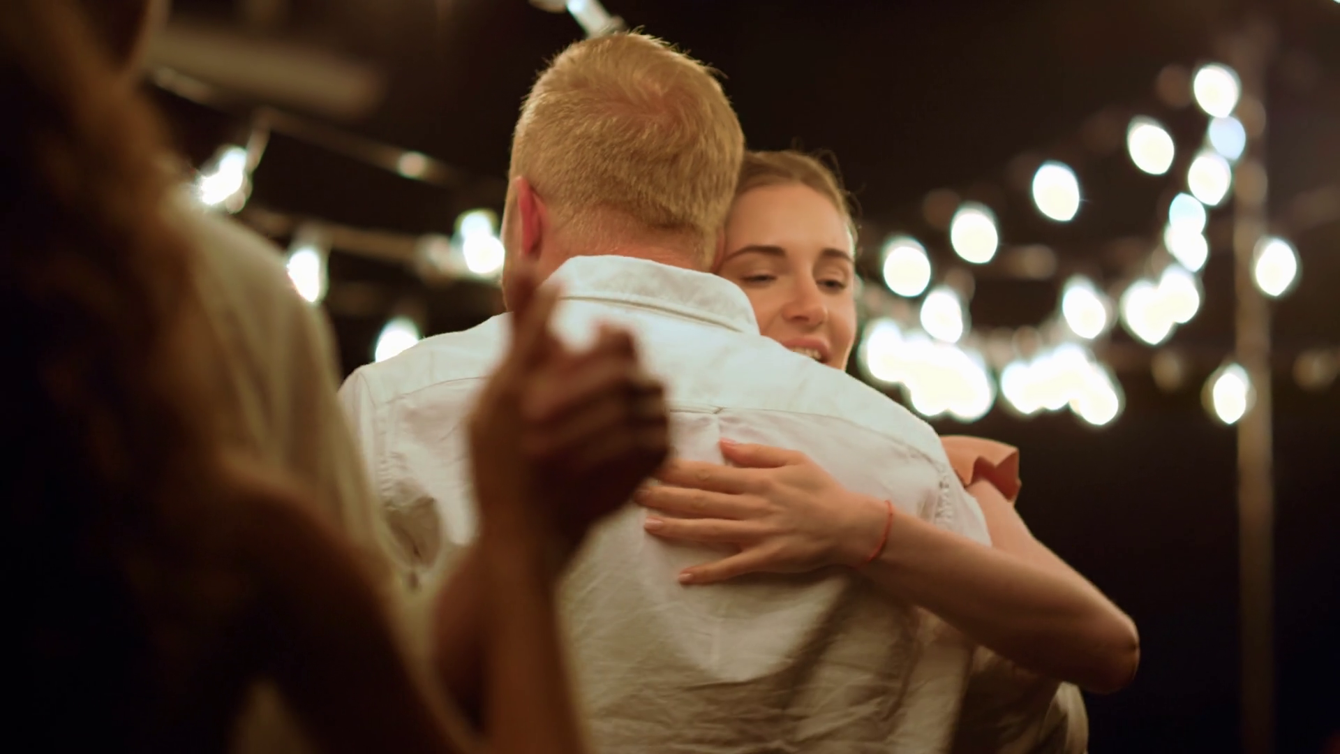 Cheerful Friends Enjoying Slow Dance At