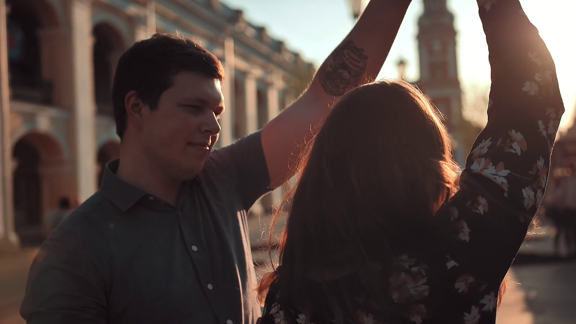 Joyful Couple Dancing In City Hand