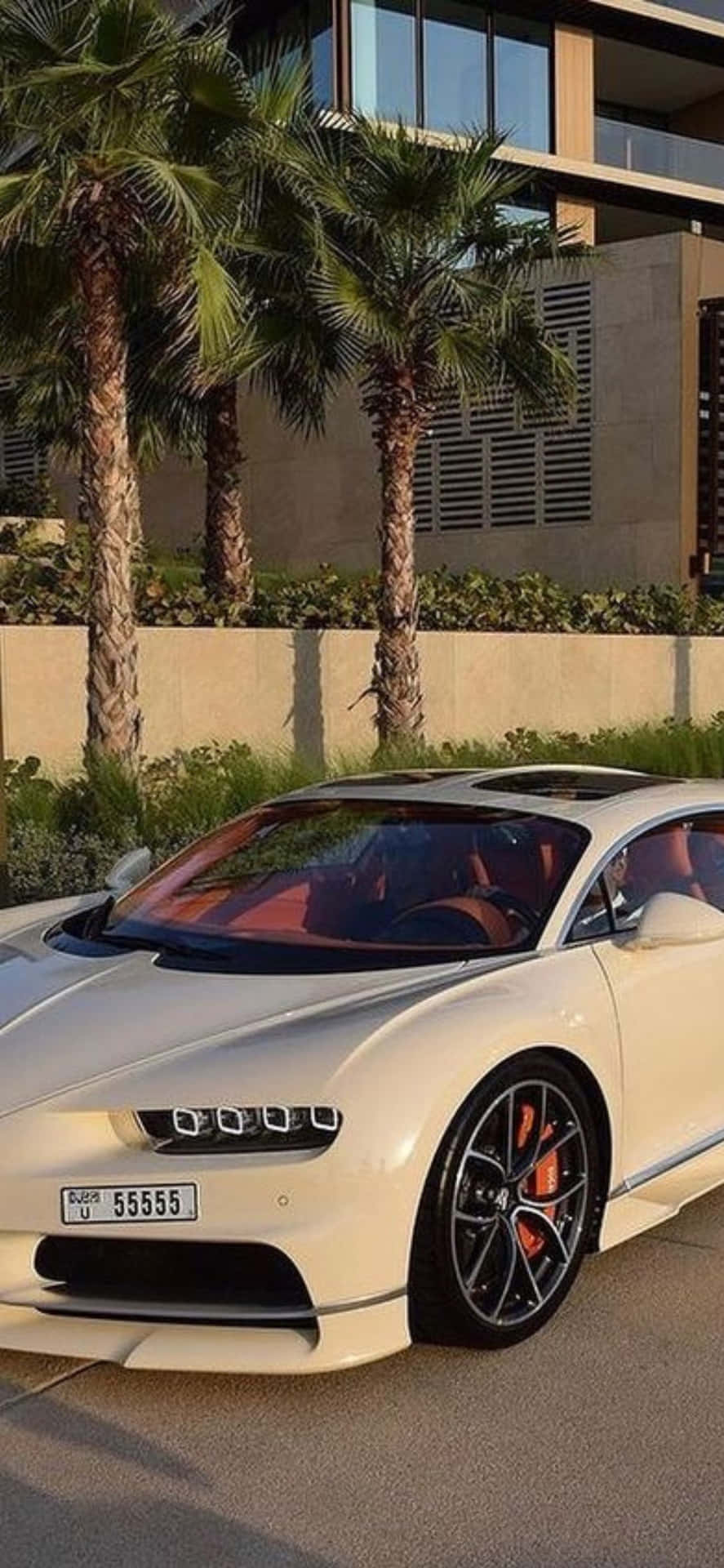 iPhone XS and a Bugatti Veyron