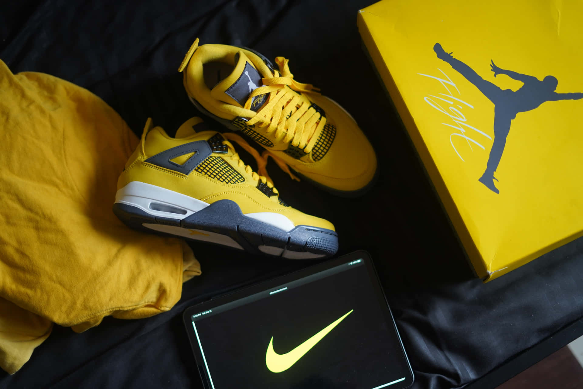 Download A Yellow Nike Air Jordan 4 Is