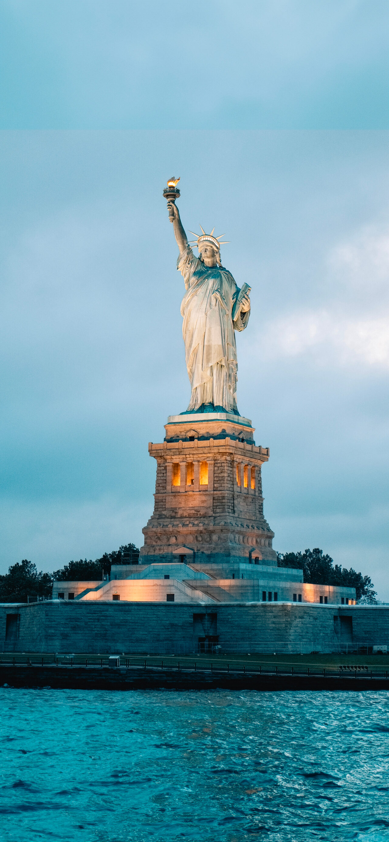 Statue of Liberty after sunset. Depth