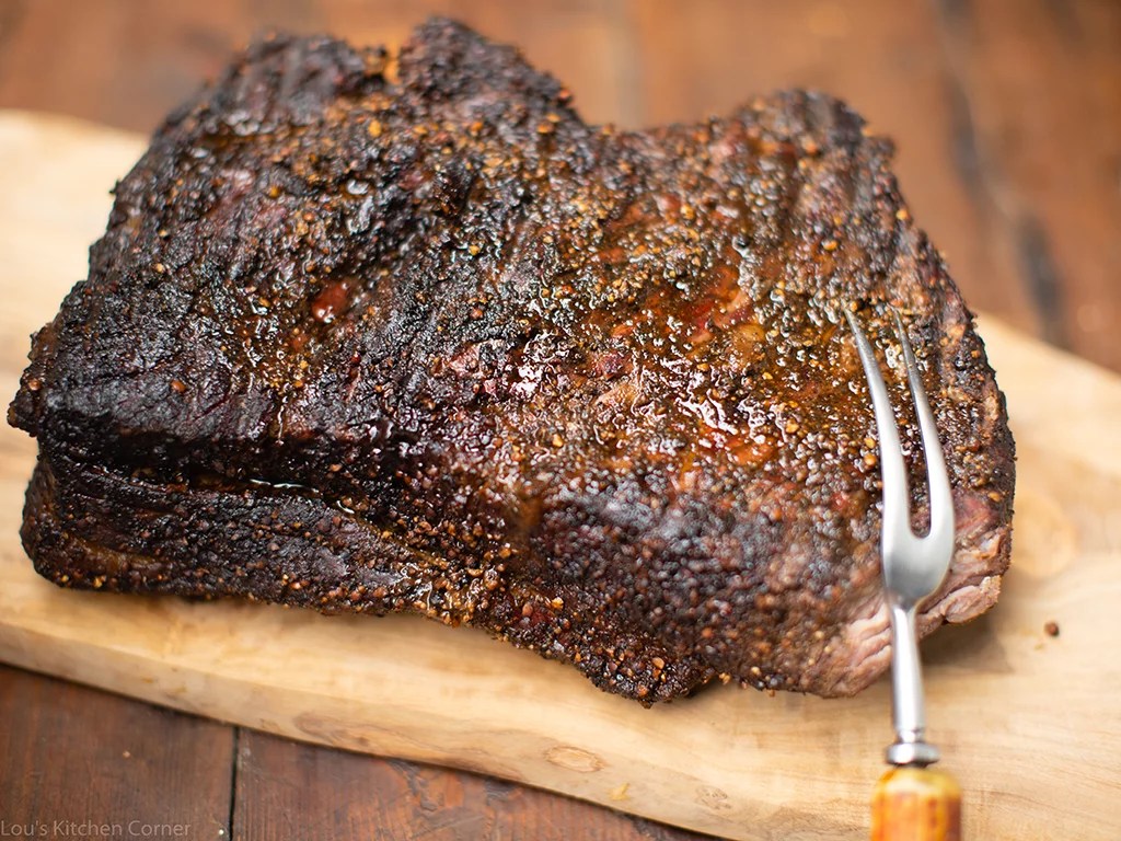 Low and slo smoked brisket • Lou's