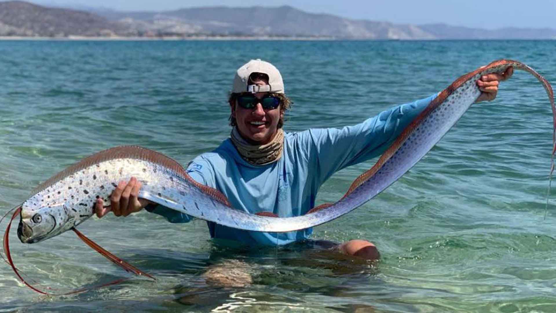Fishermen release juvenile Oarfish back