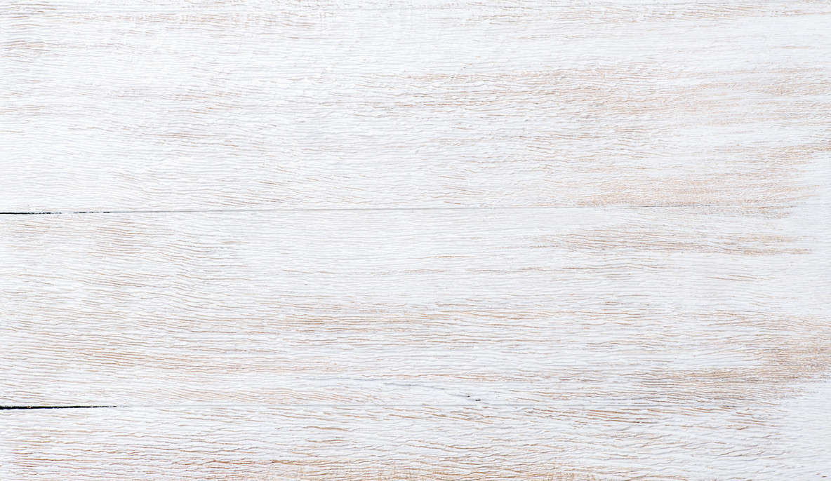 Old threadbare white painted wooden