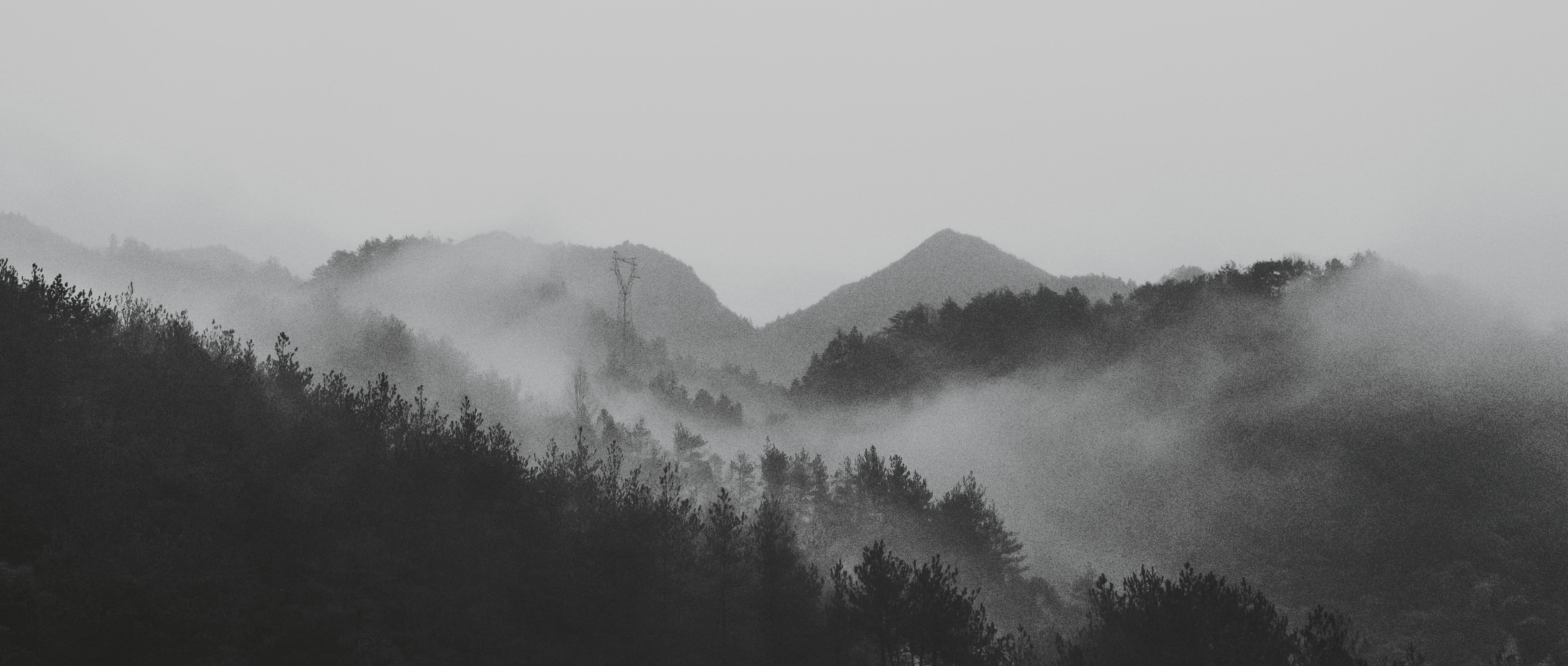 Panoramic View of Foggy Mountains