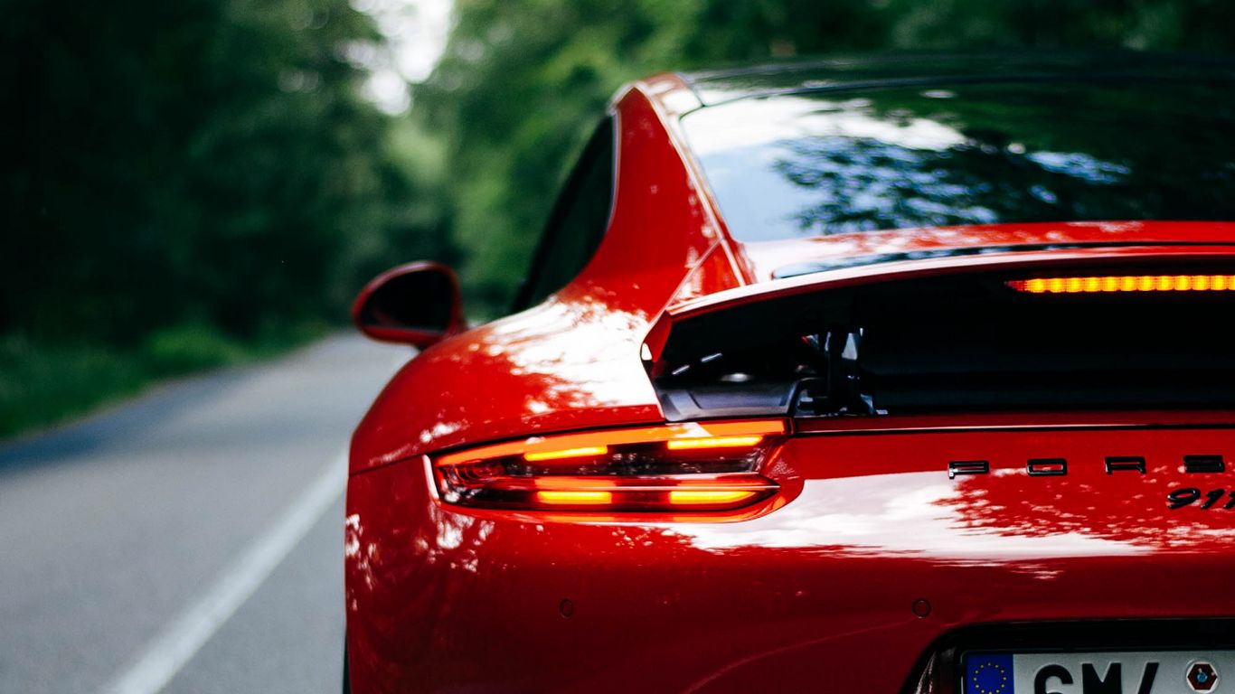 Download wallpaper 1366x768 porsche 911
