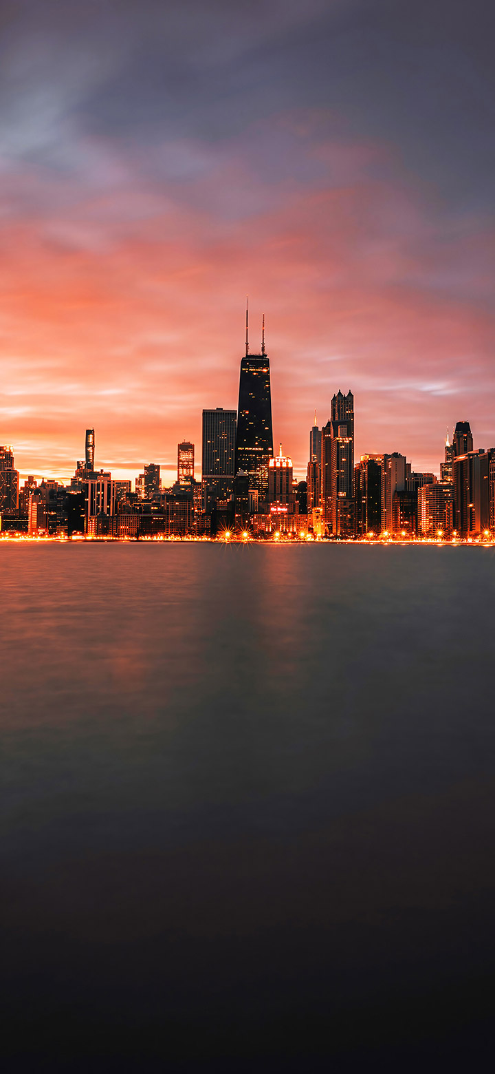 Dark City Skyline Next To A Lake 4K