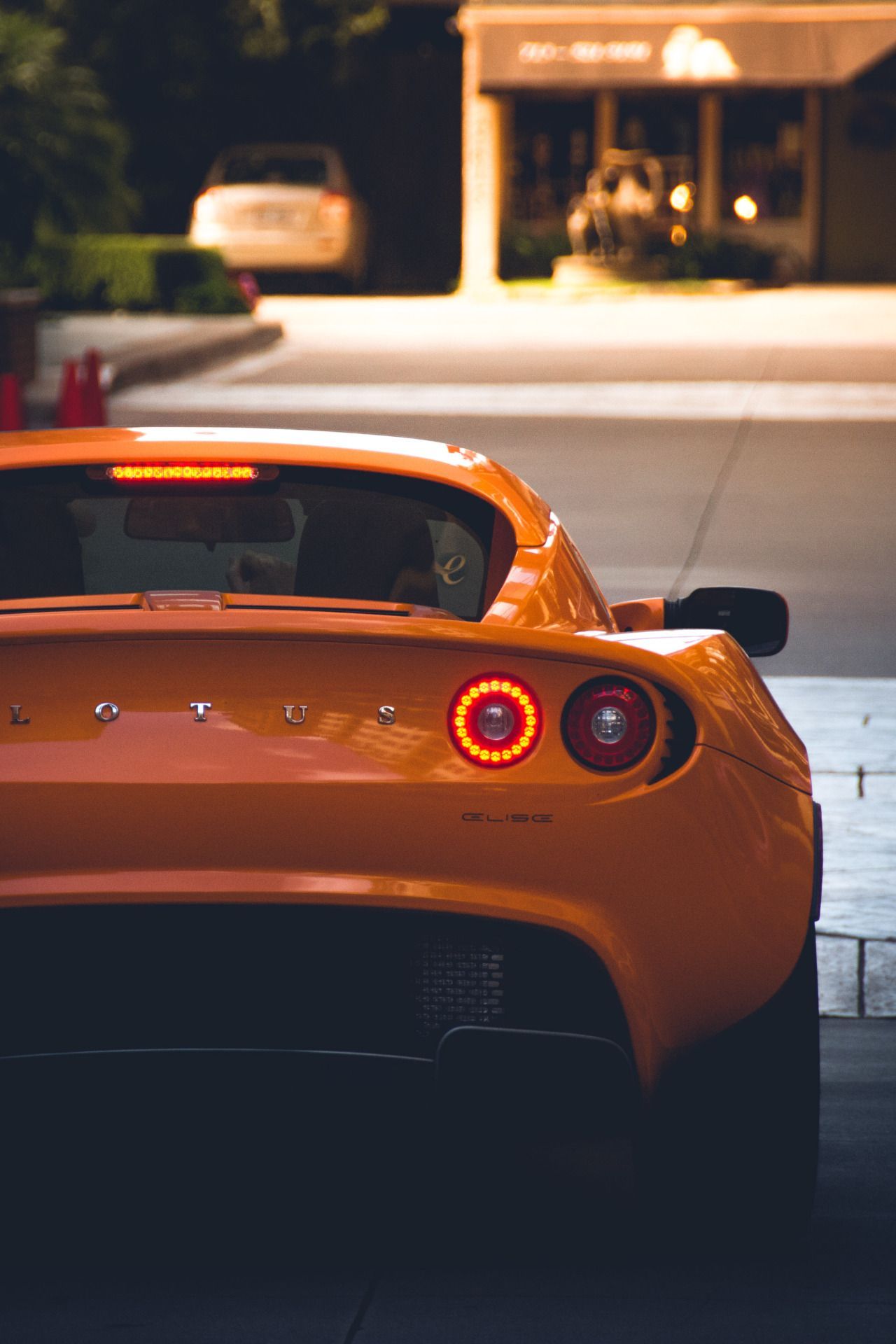 Orange Lotus Elise Dark Wallpaper