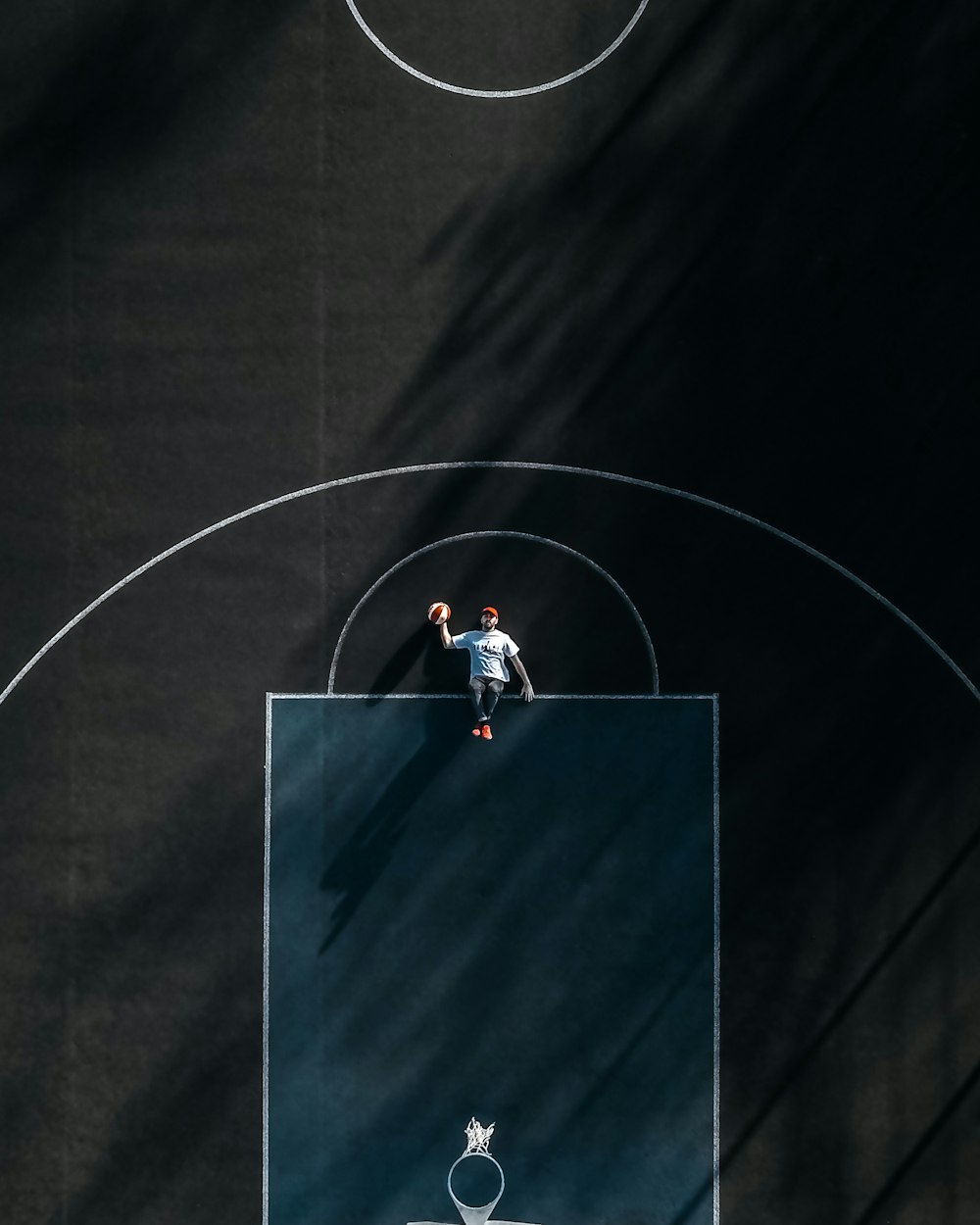 T Shirt Lying On Basketball Court Photo