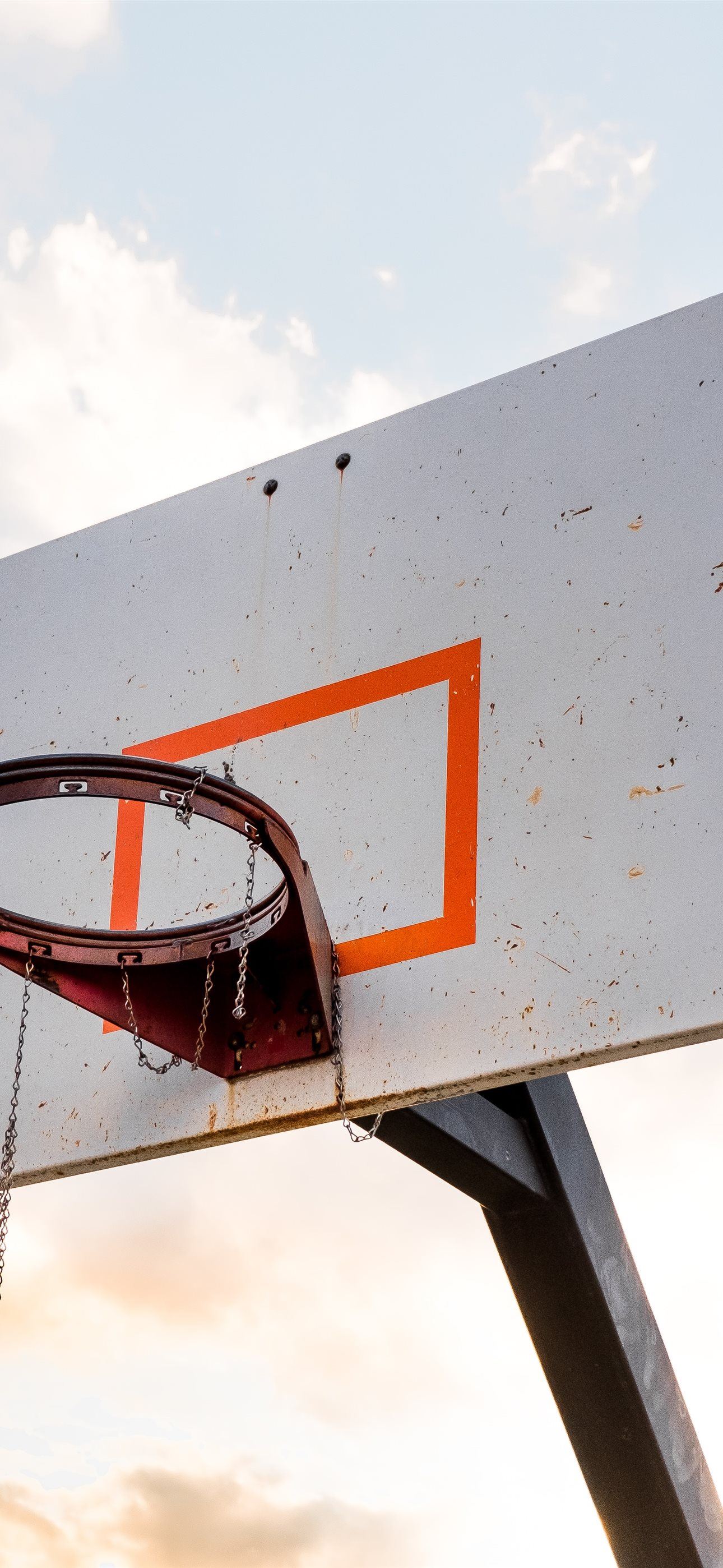 orange steel basketball hoop mounted