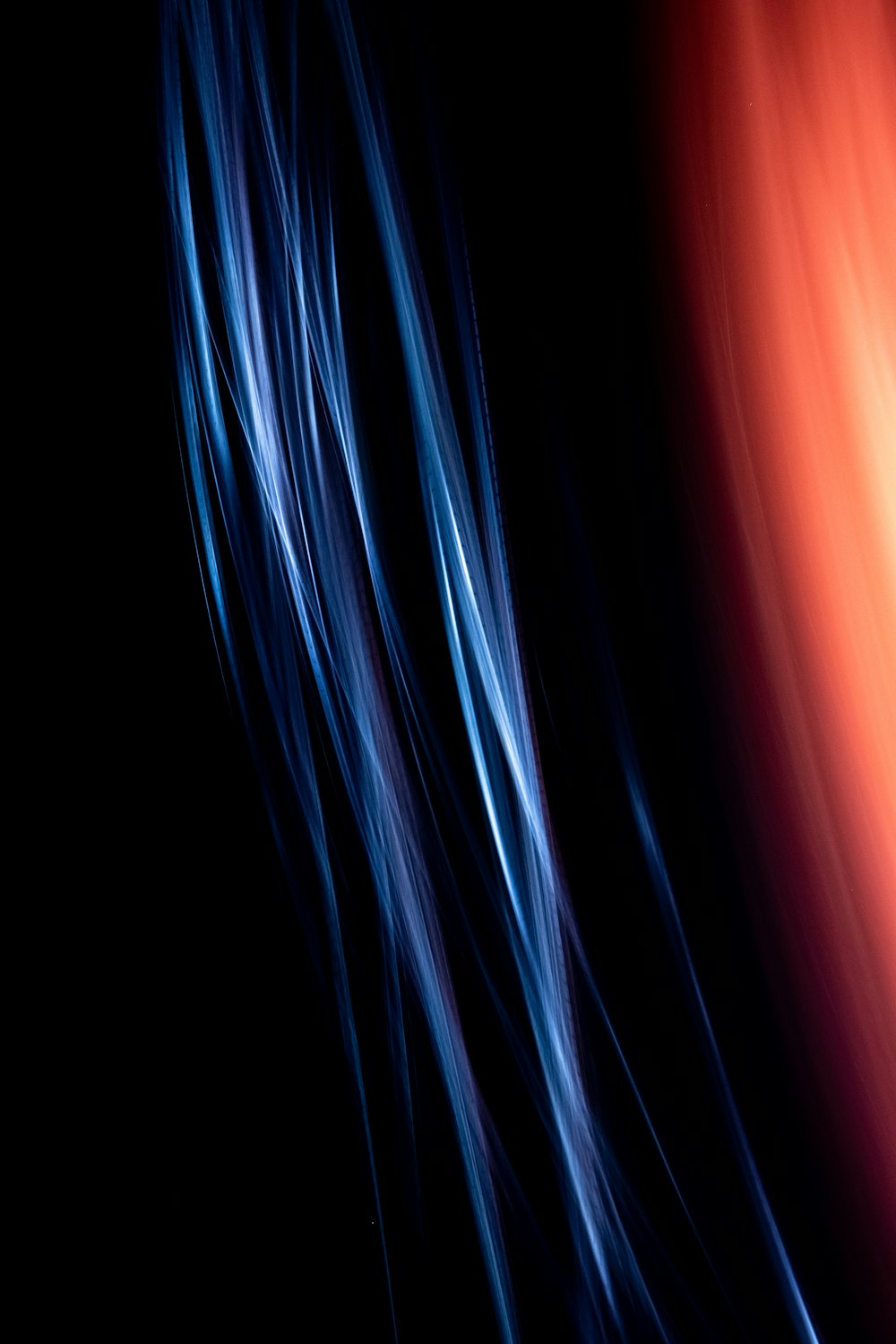 A black background with red and blue