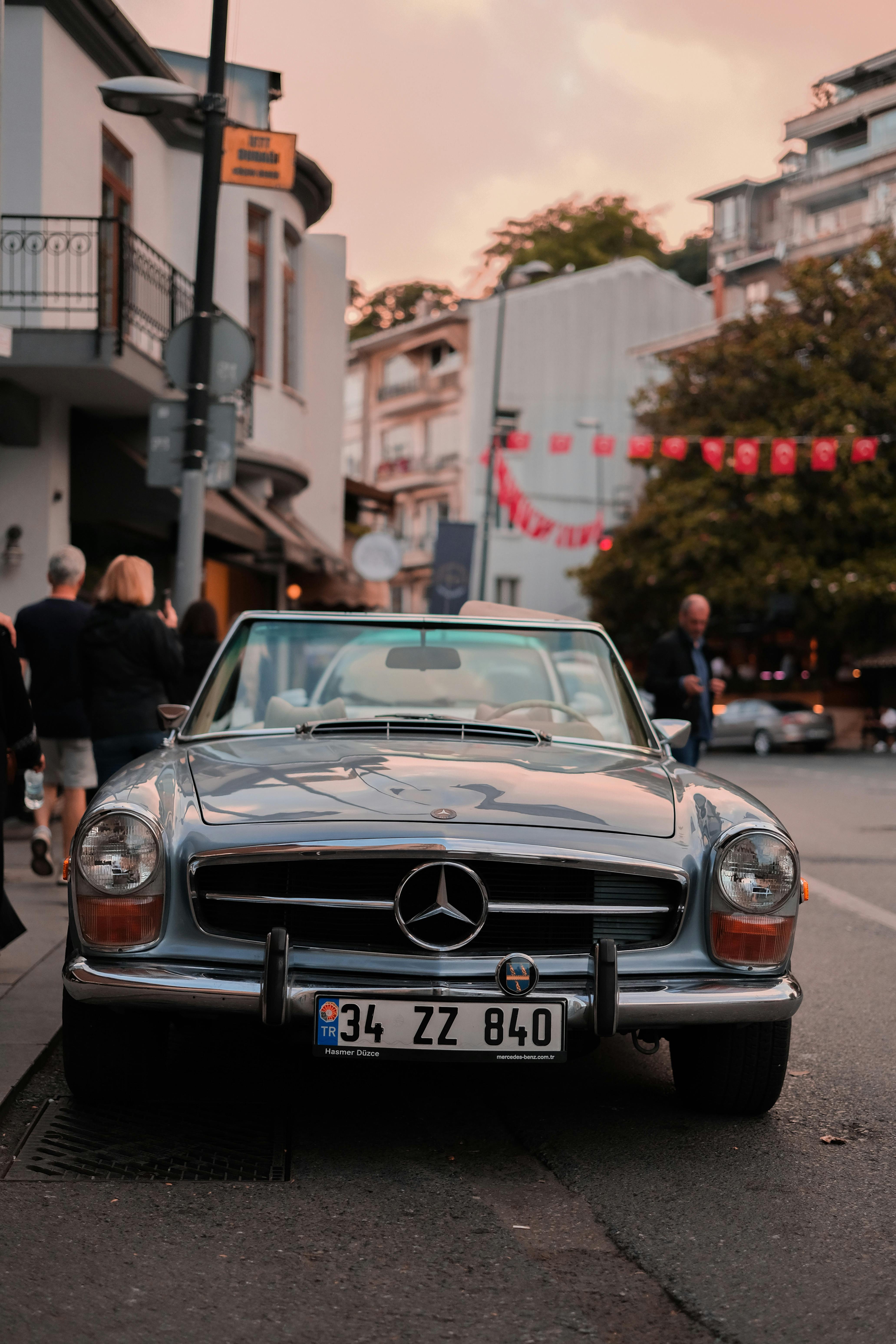 A Vintage Mercedes Benz W113 Parked