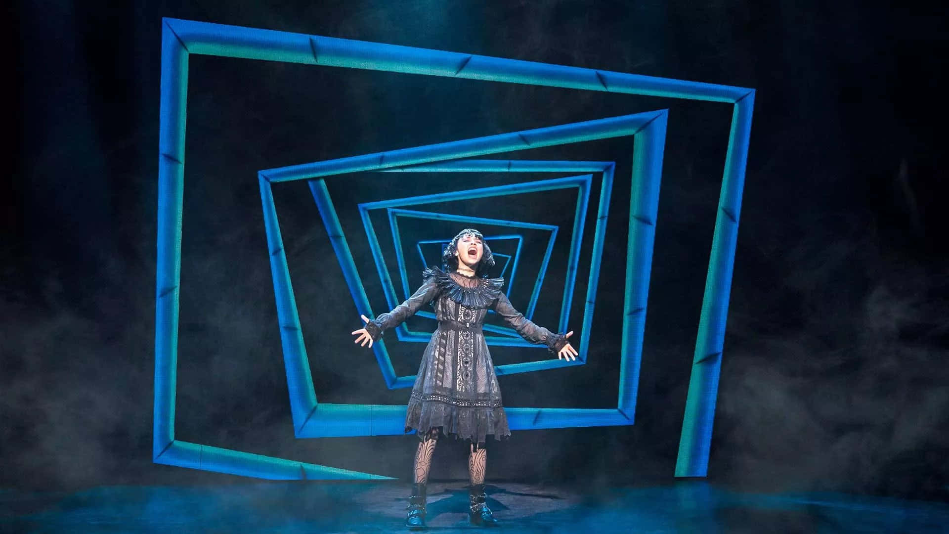 pose in his iconic striped suit