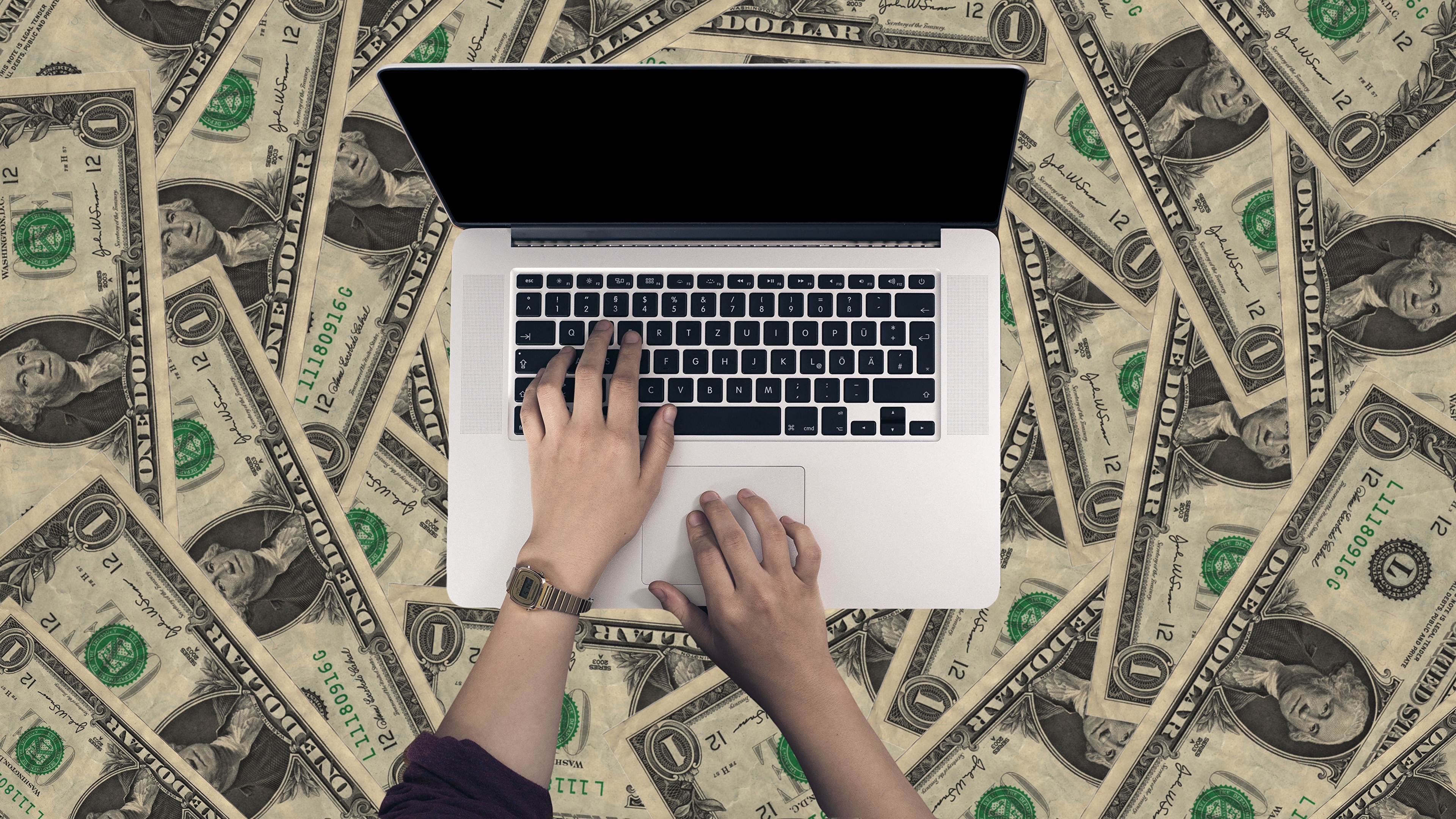 image Laptops Dollars Paper money