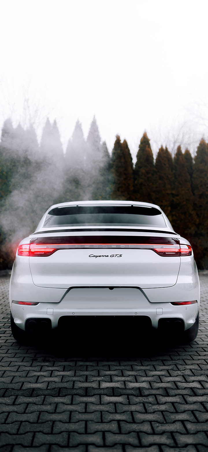 White Porsche On A Misty Day 4K Phone Wallpaper