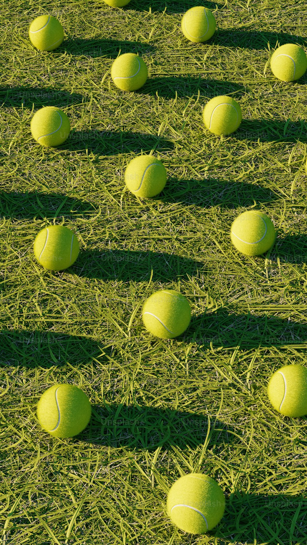 A group of tennis balls sitting on top