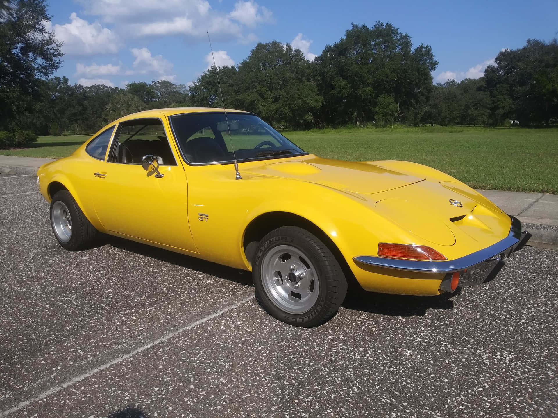 Iconic Opel Gt On The Highway Wallpaper