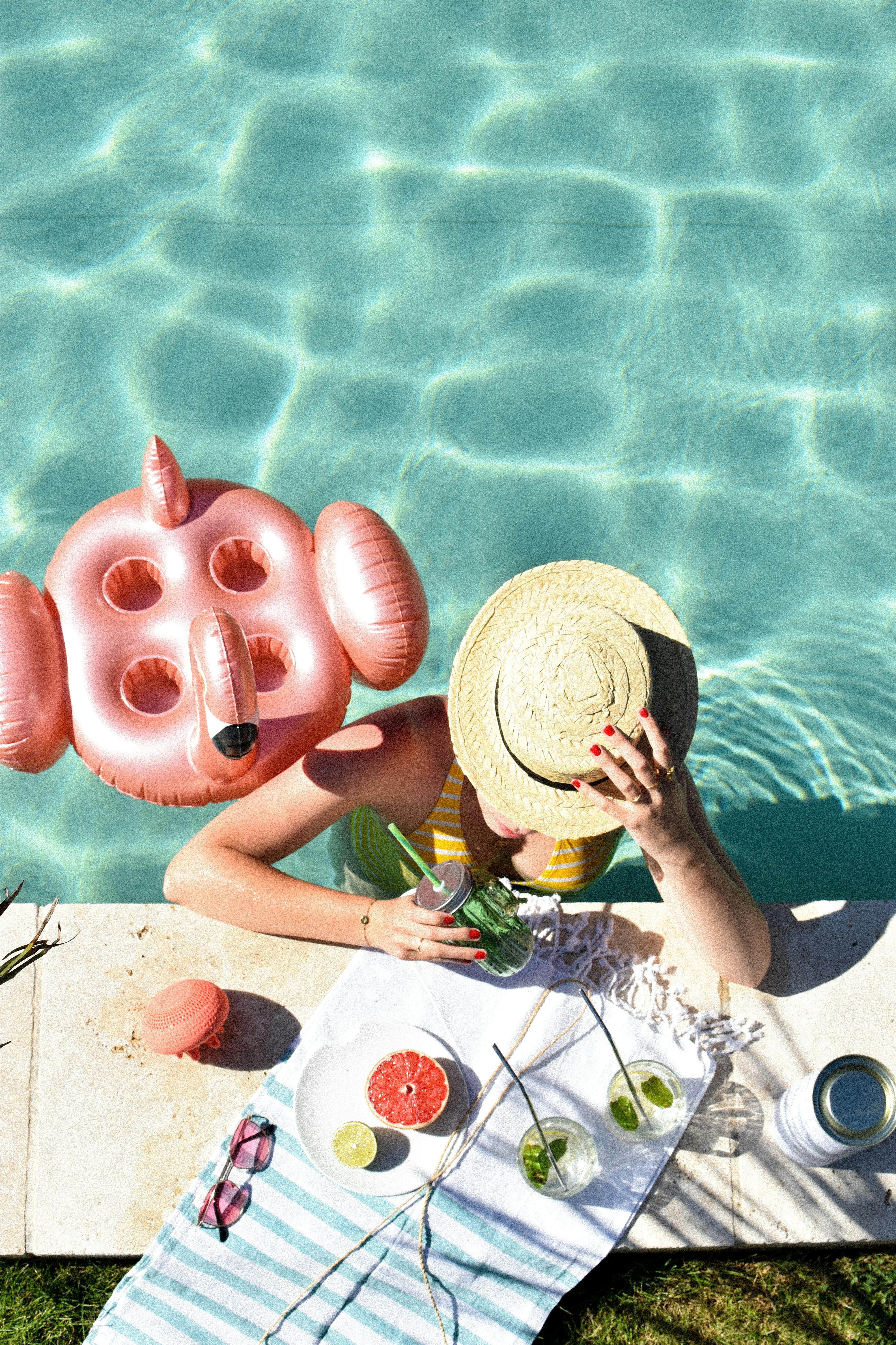 A Woman Swimming in the Pool · Free