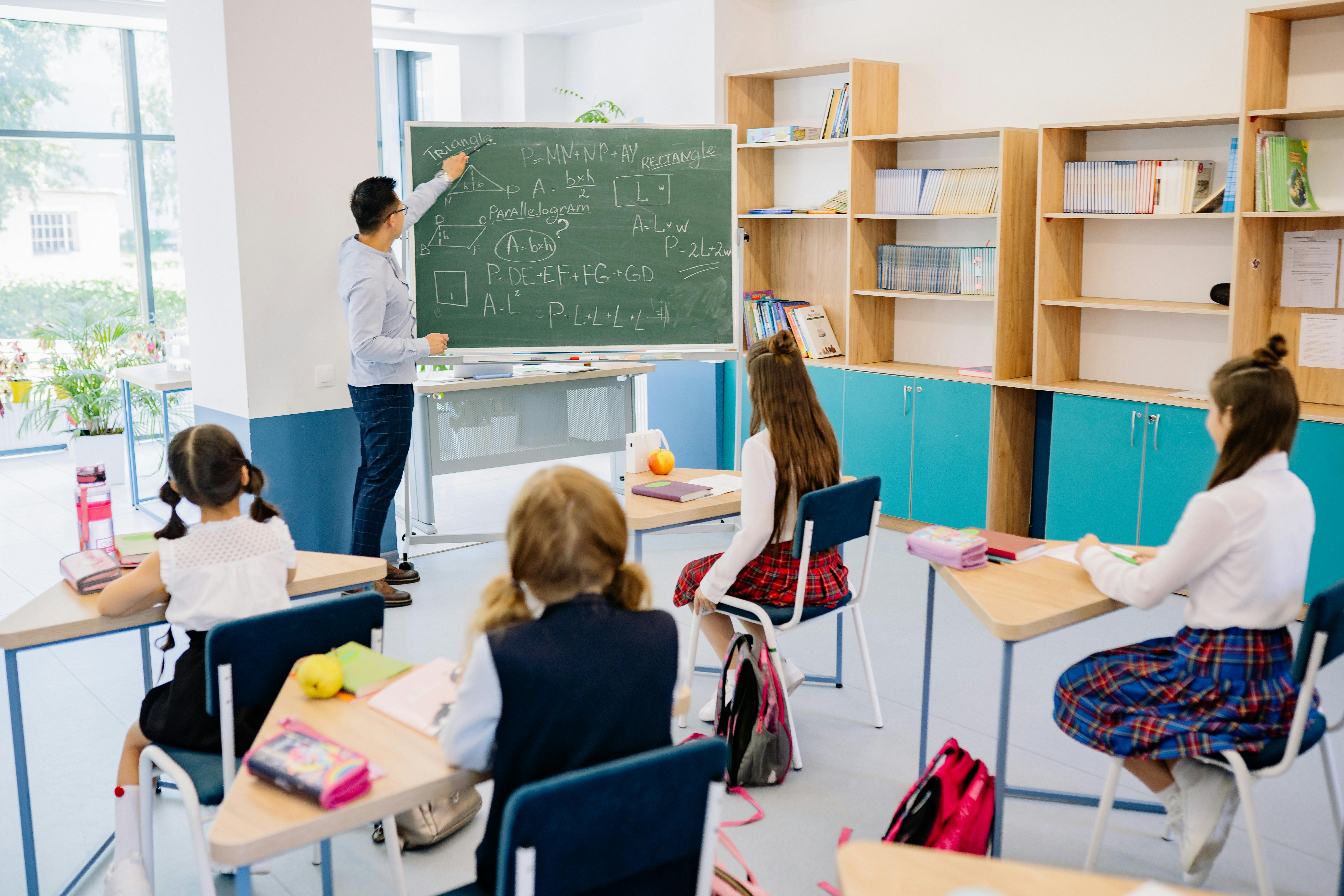 Teacher in a Classroom · Free