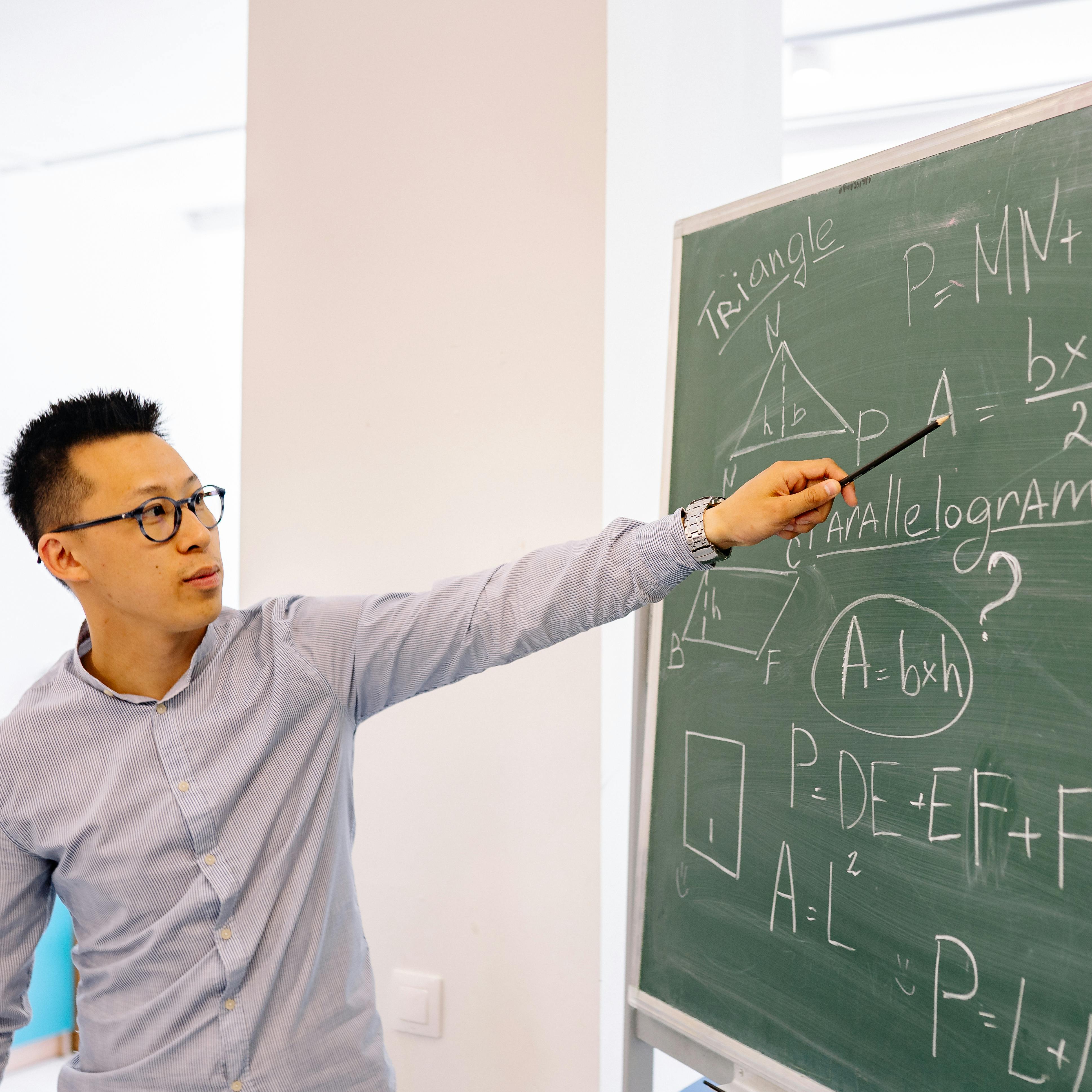 Male Teacher Teaching a Lesson · Free