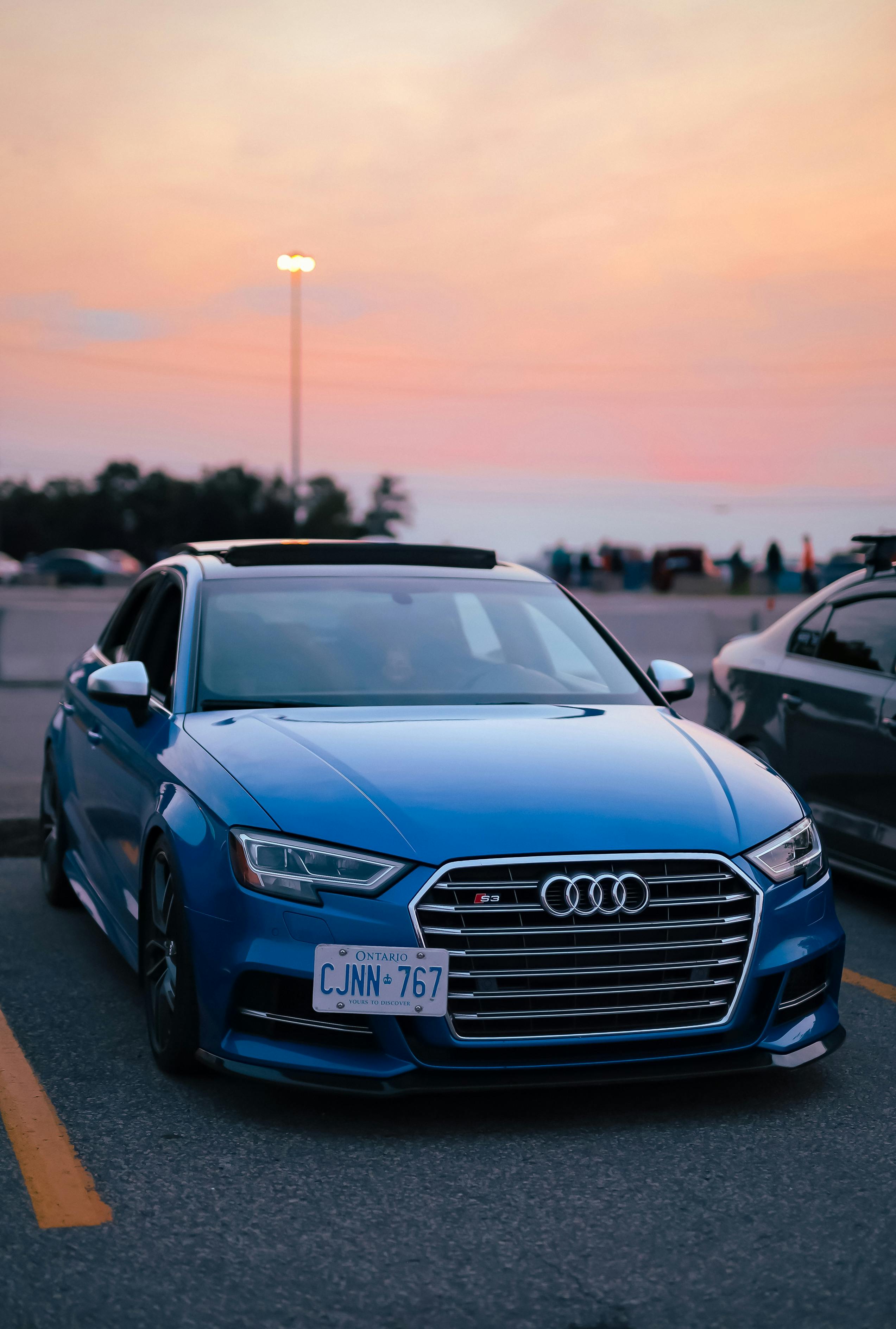 Blue Audi Car at Sunset · Free