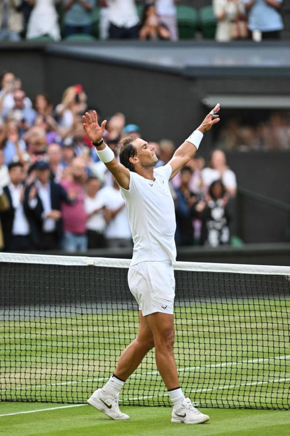 Nadal overcomes injury, Fritz in five