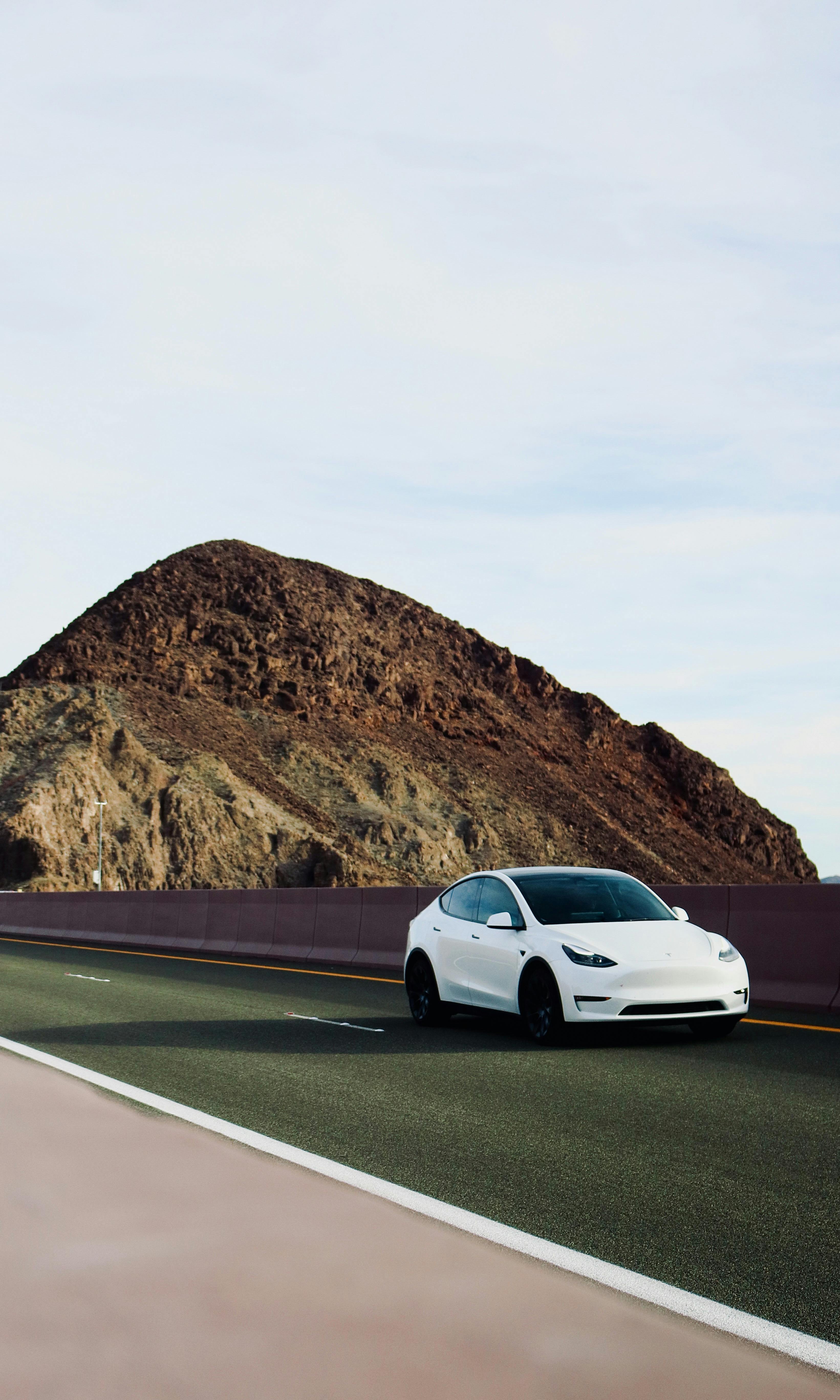 Tesla Model 3 on Road · Free