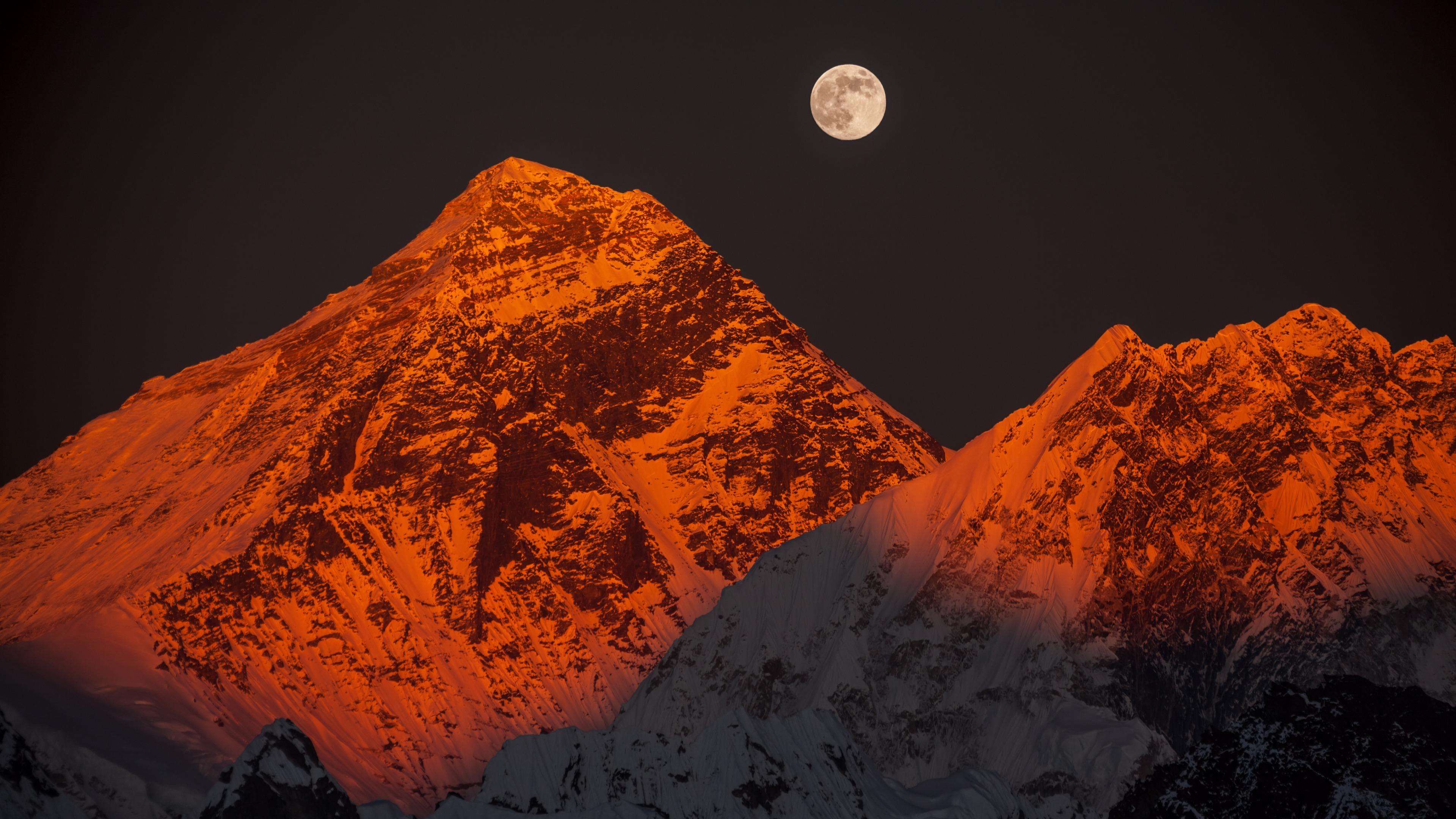 The Moon On The Snow Capped Peaks