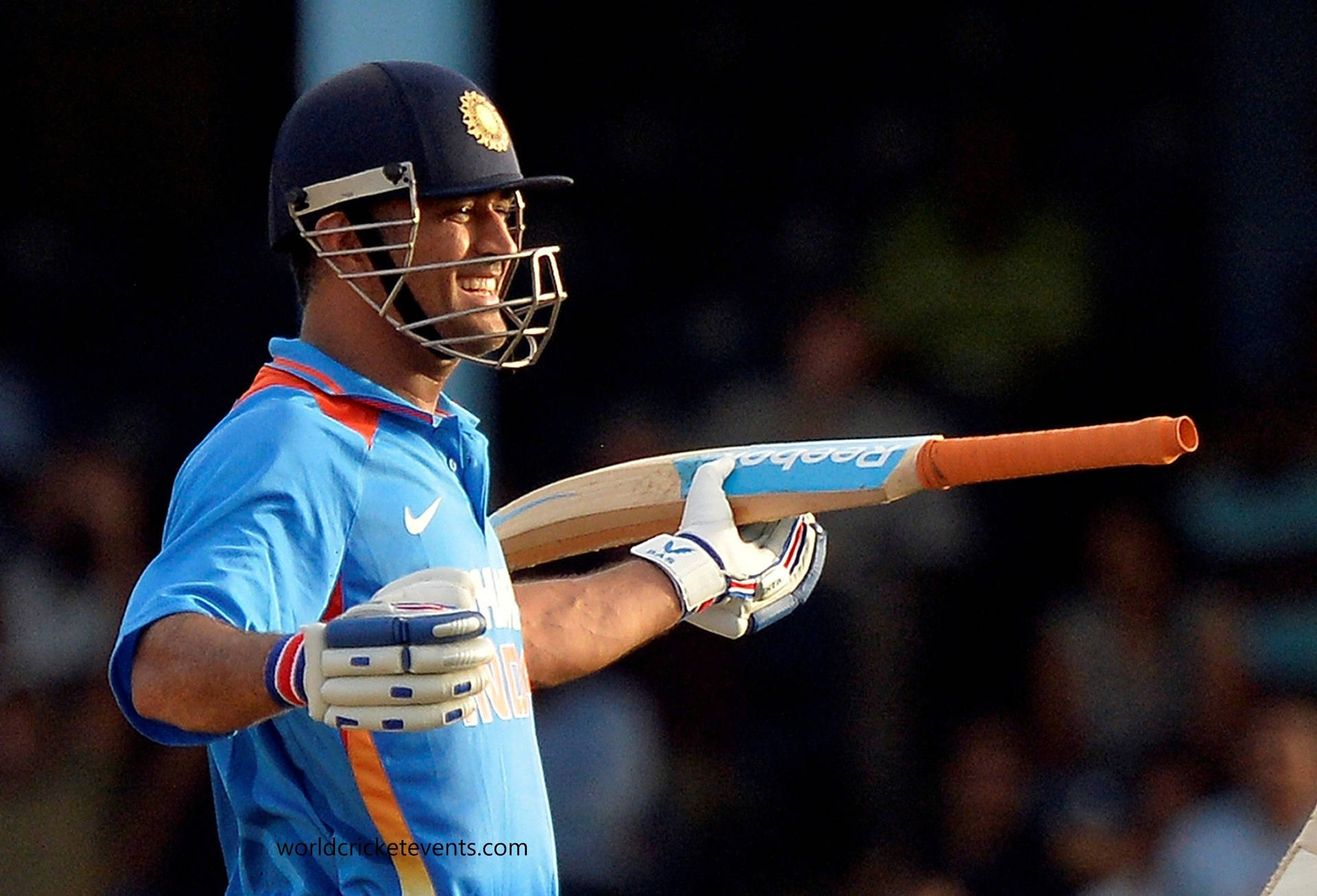 Download Smiling Ms Dhoni HD Wallpaper