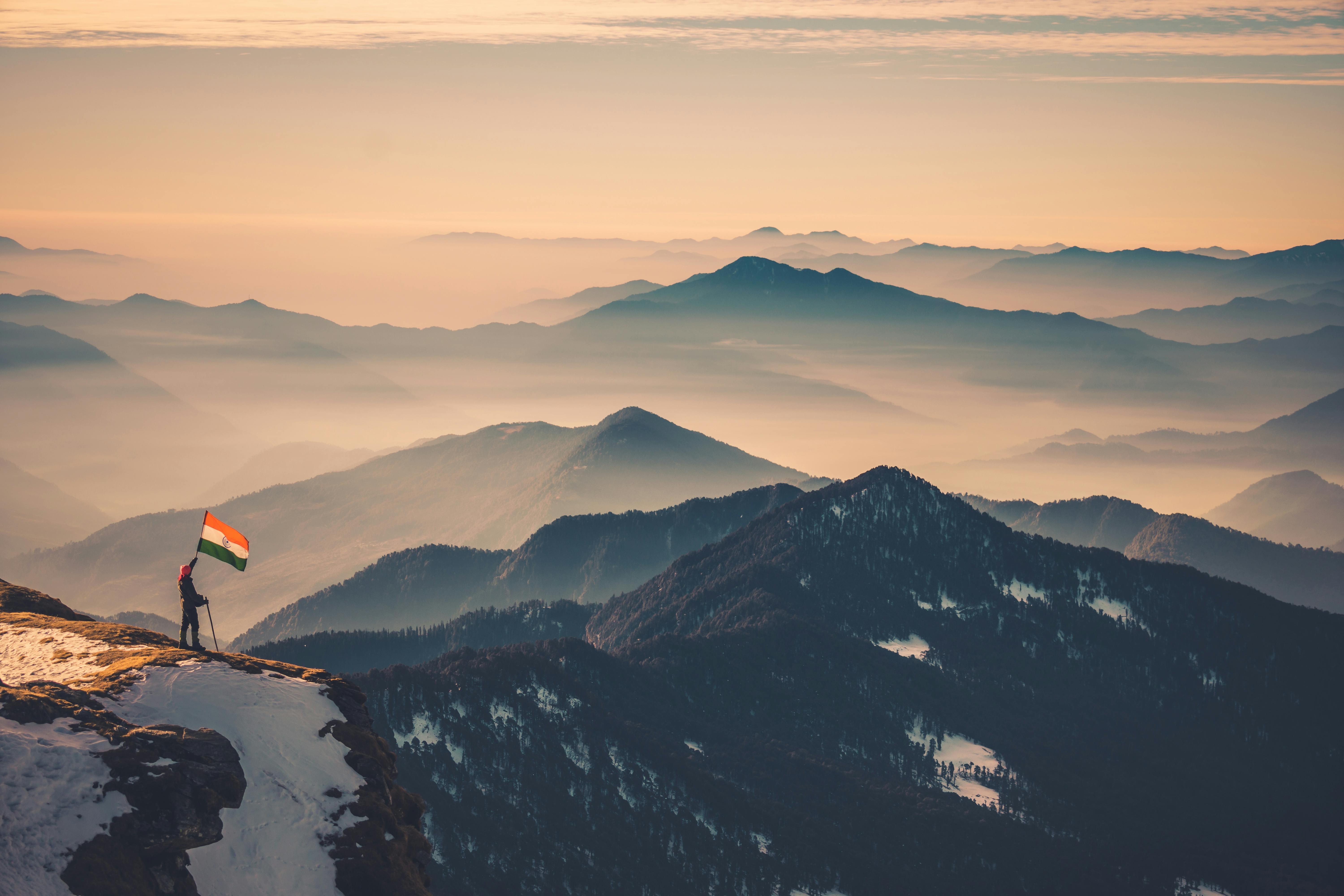 A Man Holding an Indian Flag While