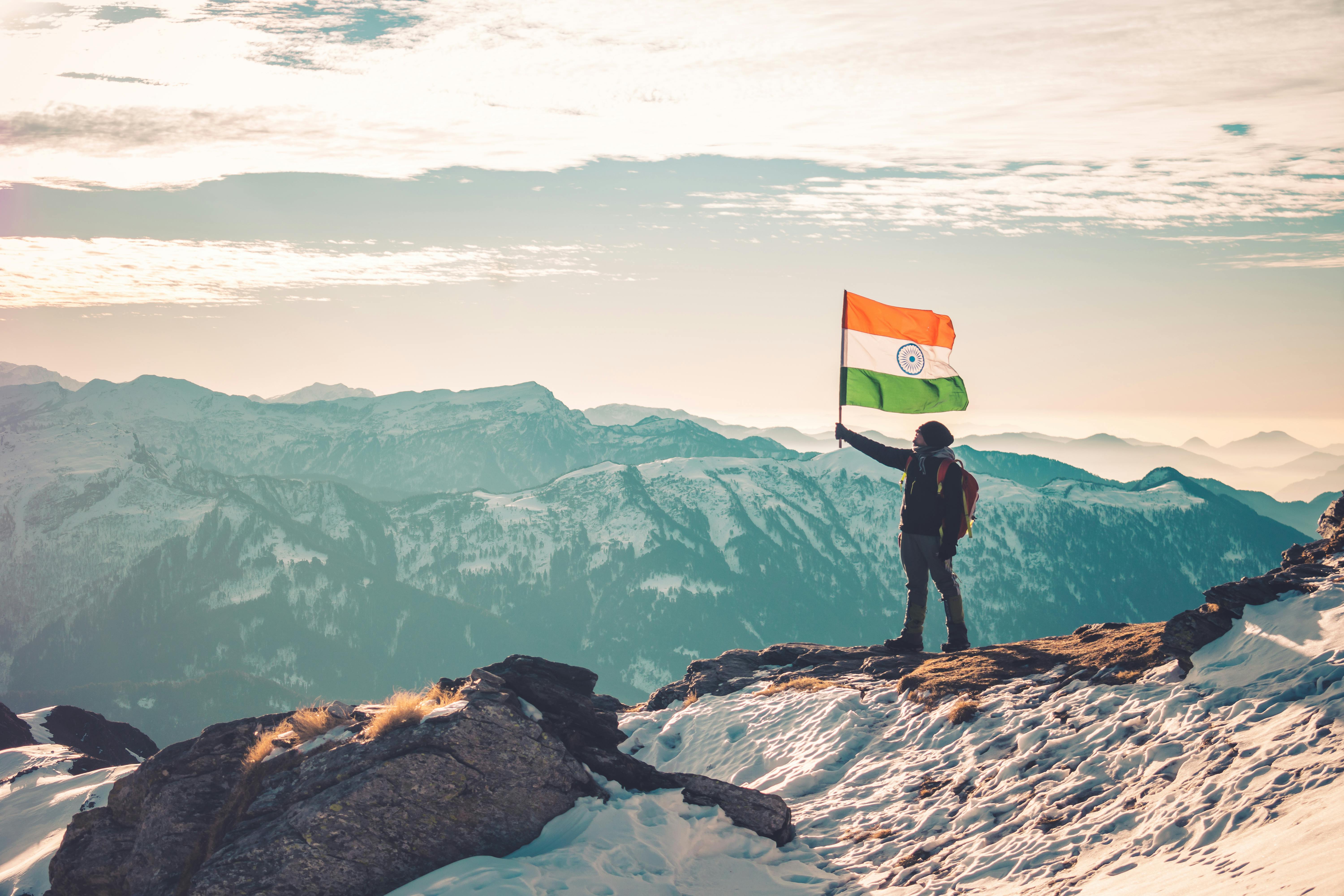 A Man Holding an Indian Flag While