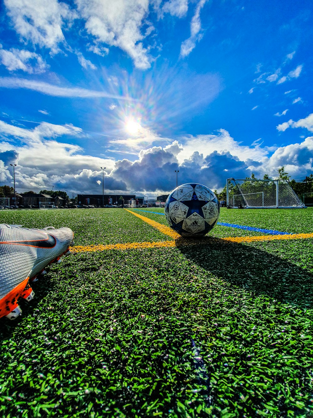 Blue and grey soccer ball on green