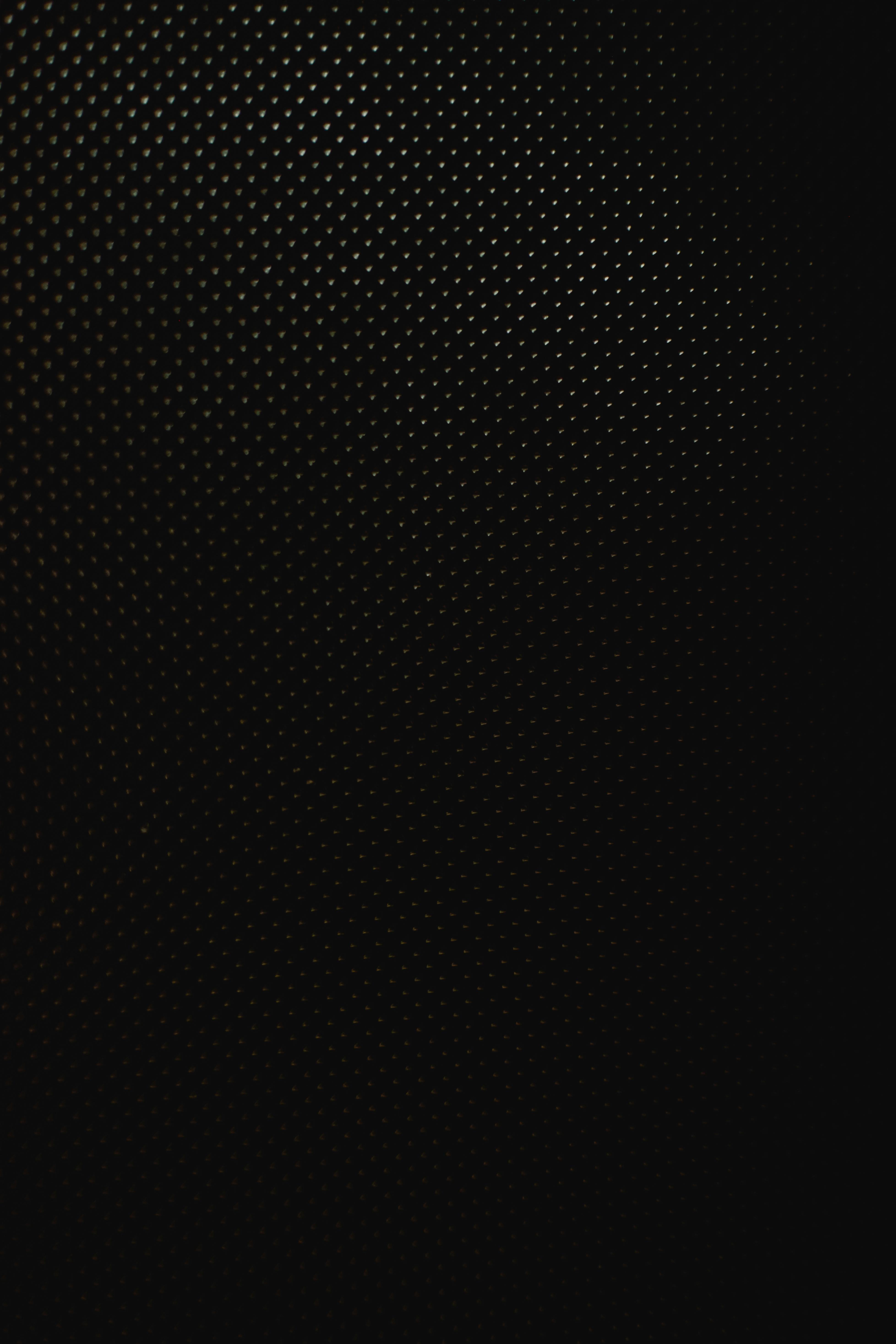 White Dots on Black Surface · Free