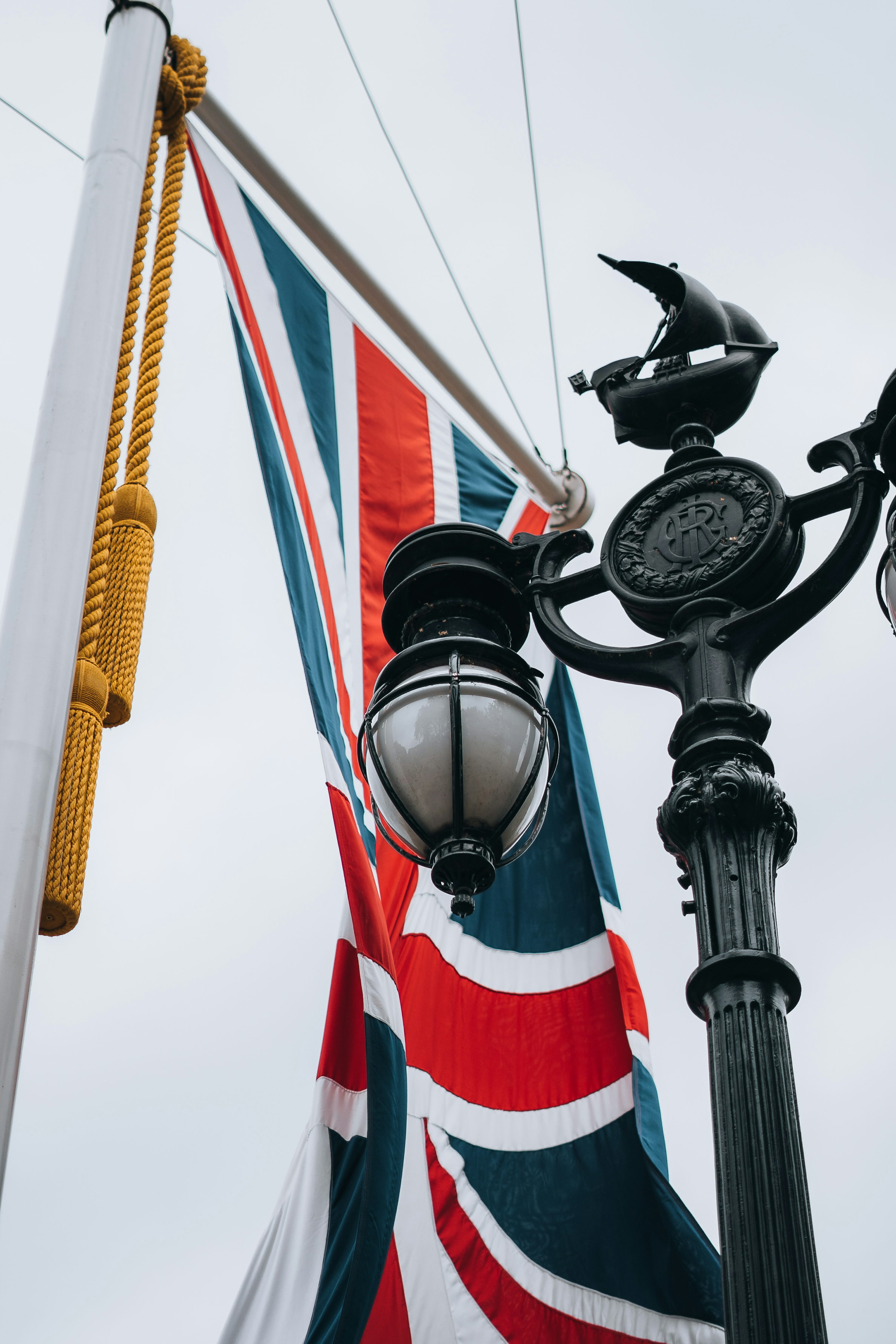 A lamp post with a british flag on it