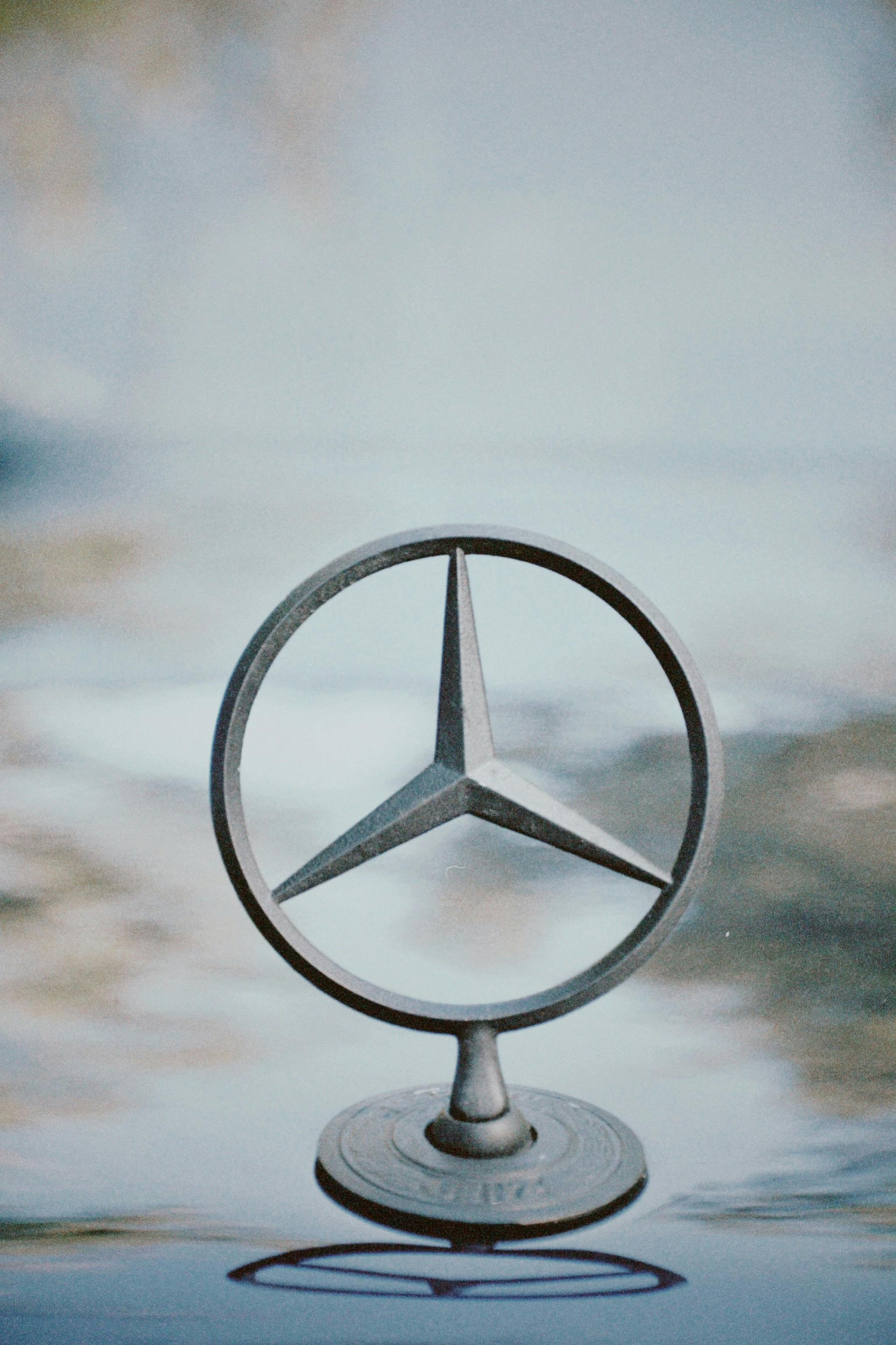 A Mercedes Logo on a Car · Free