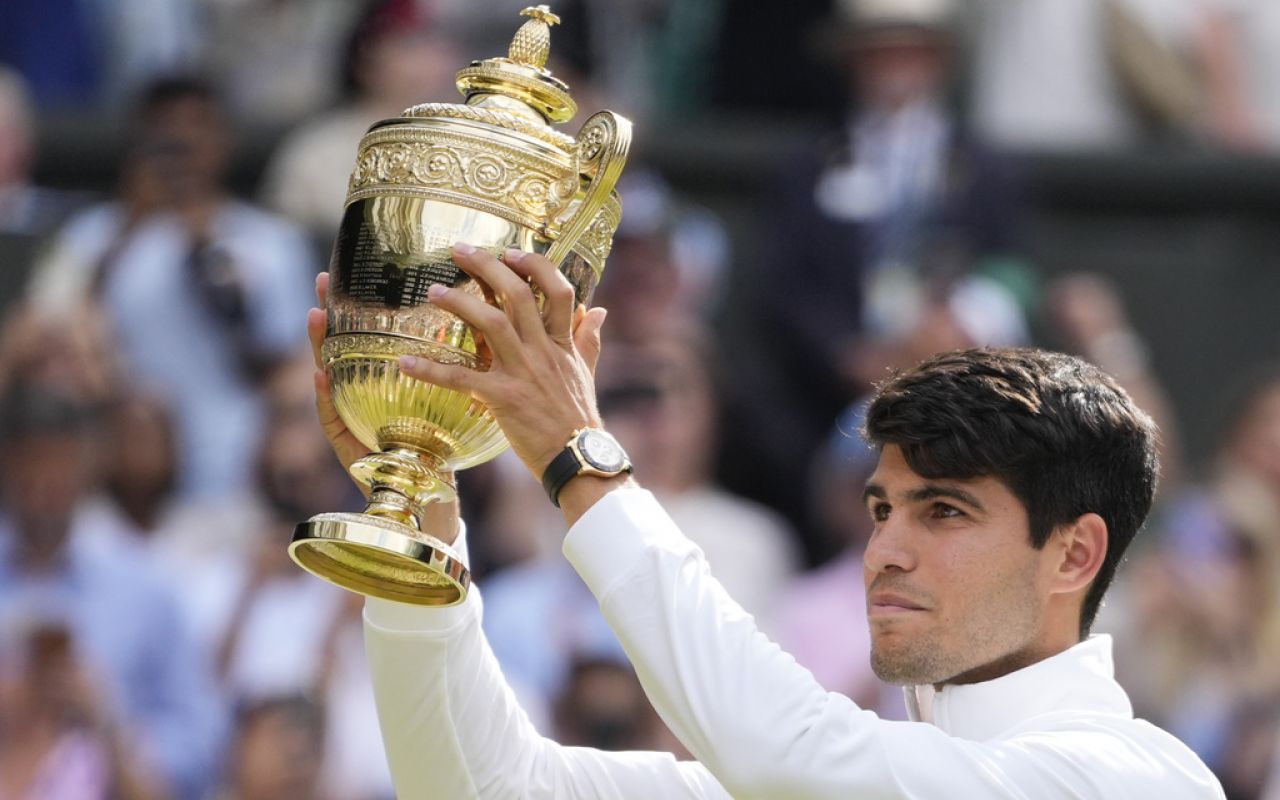 second Wimbledon and fourth Slam trophy