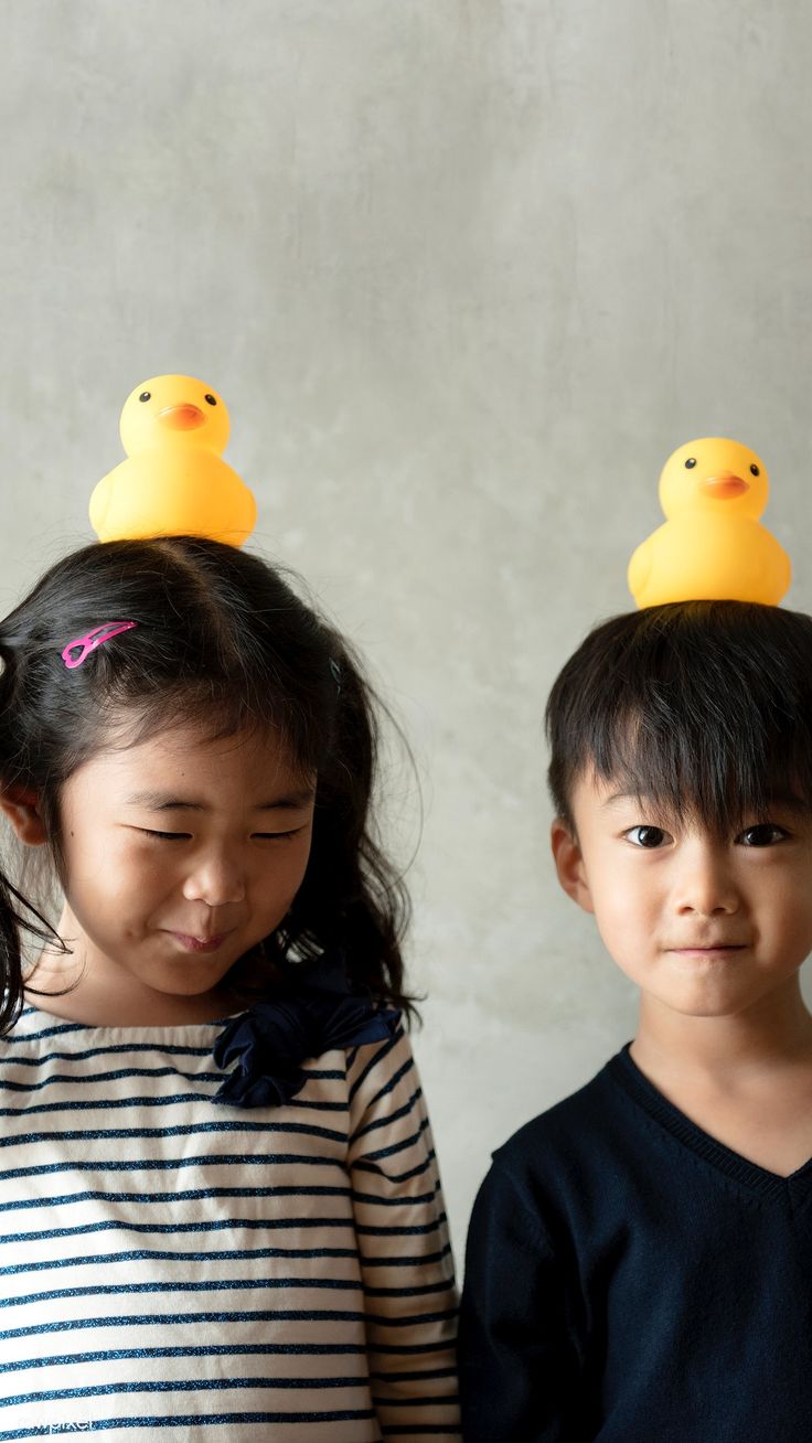 Japanese sibling playing