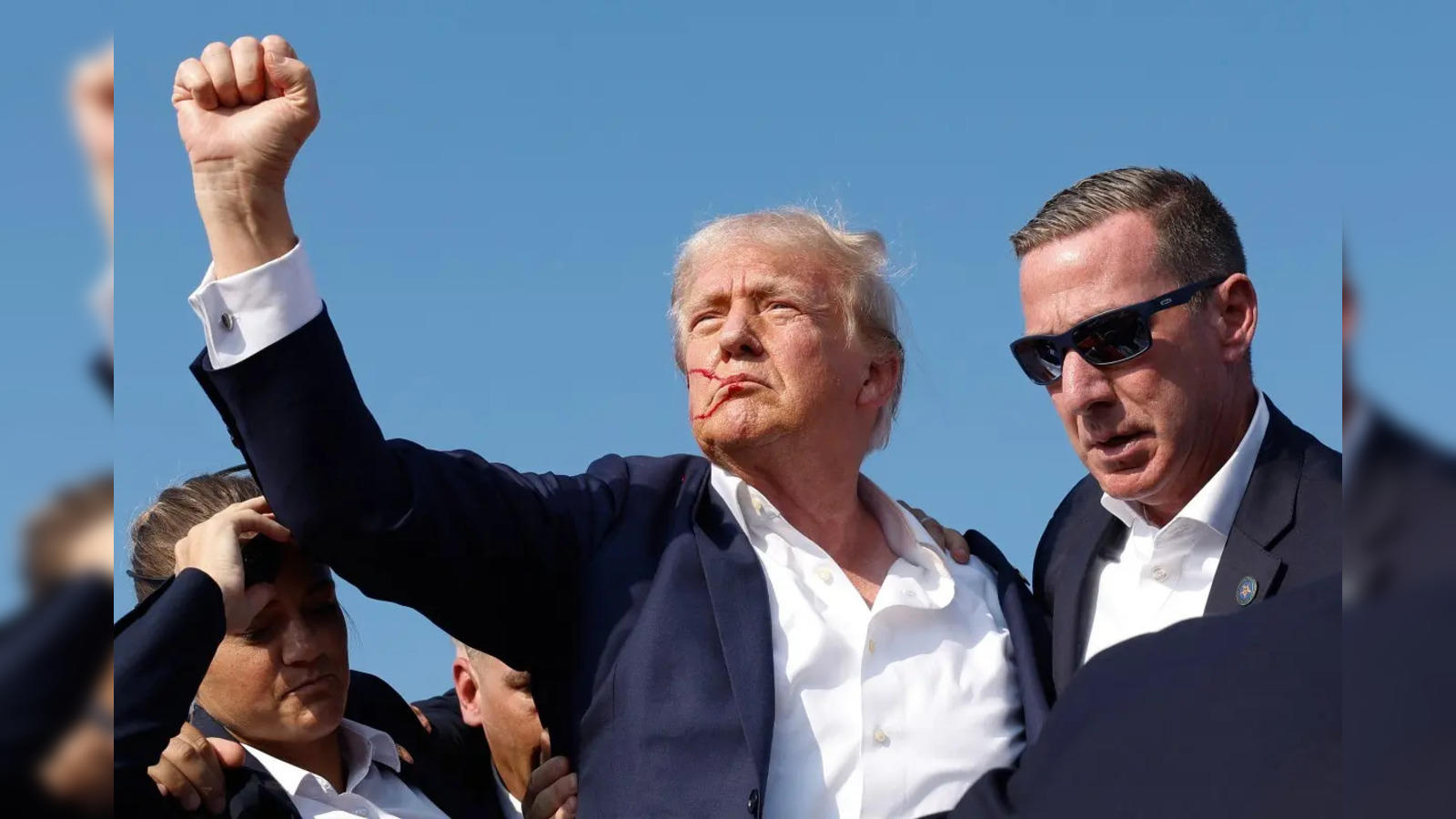 trump fist meaning: Trump's Raised Fist