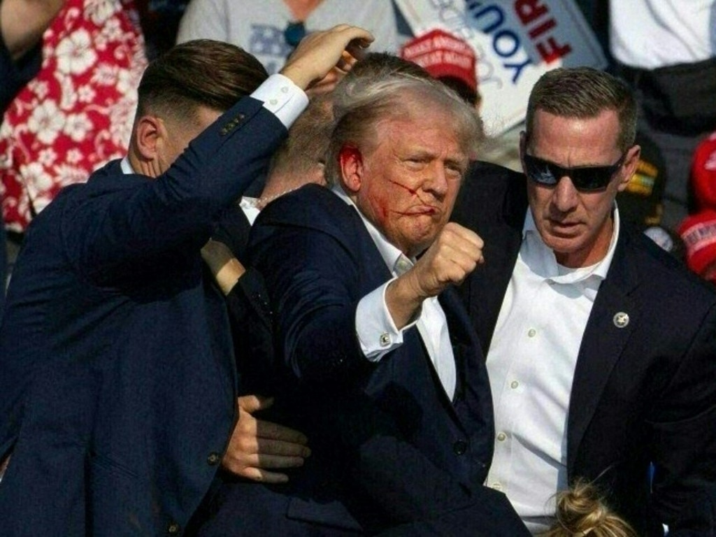 Donald Trump shot on side of head at US
