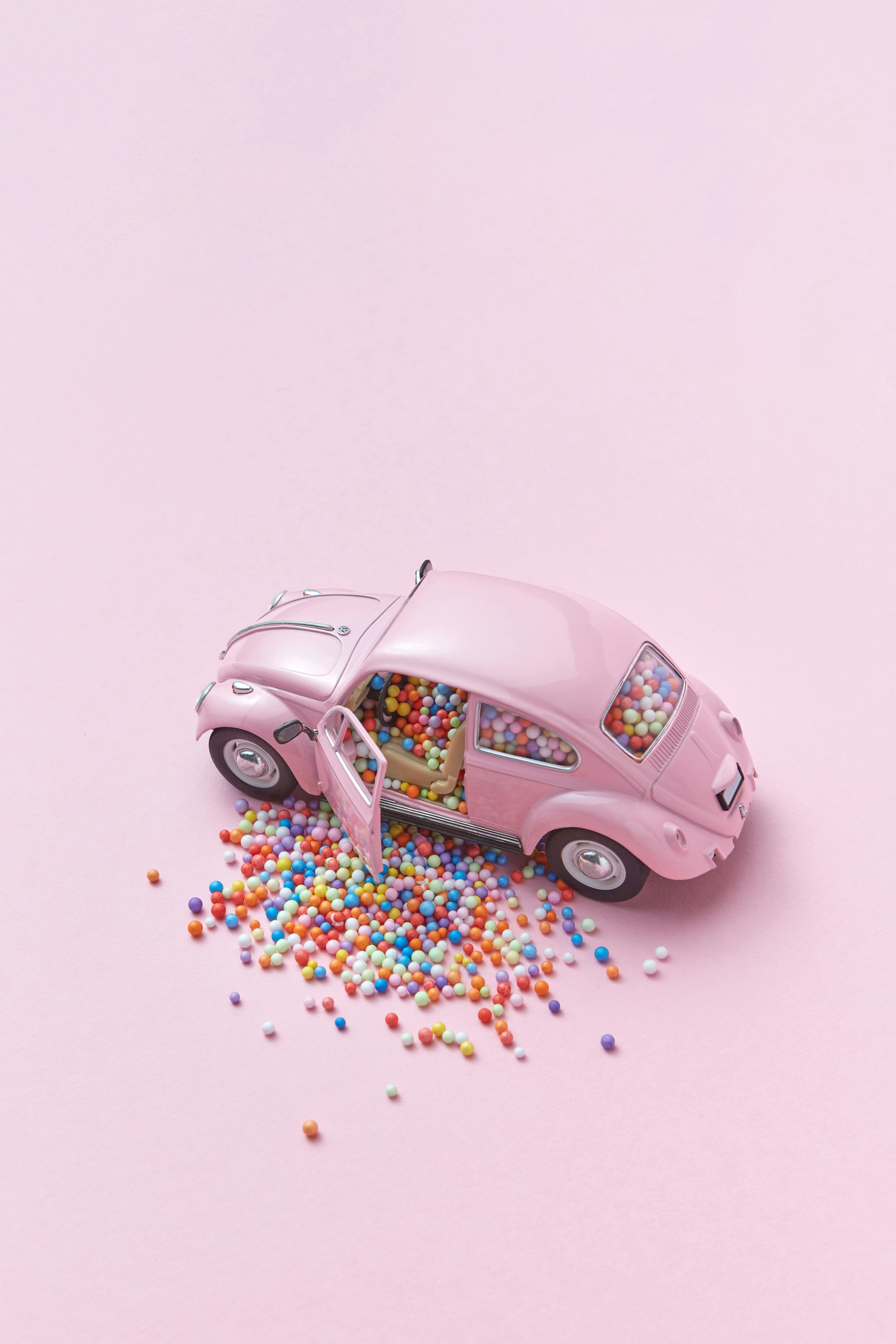 Pink Toy Car on Pink Background · Free