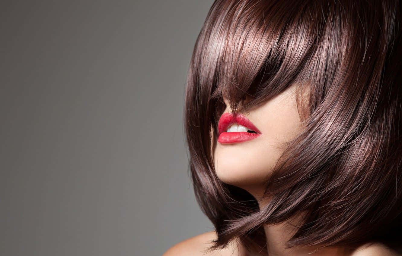 Woman With A Brown Bob And Red Lips