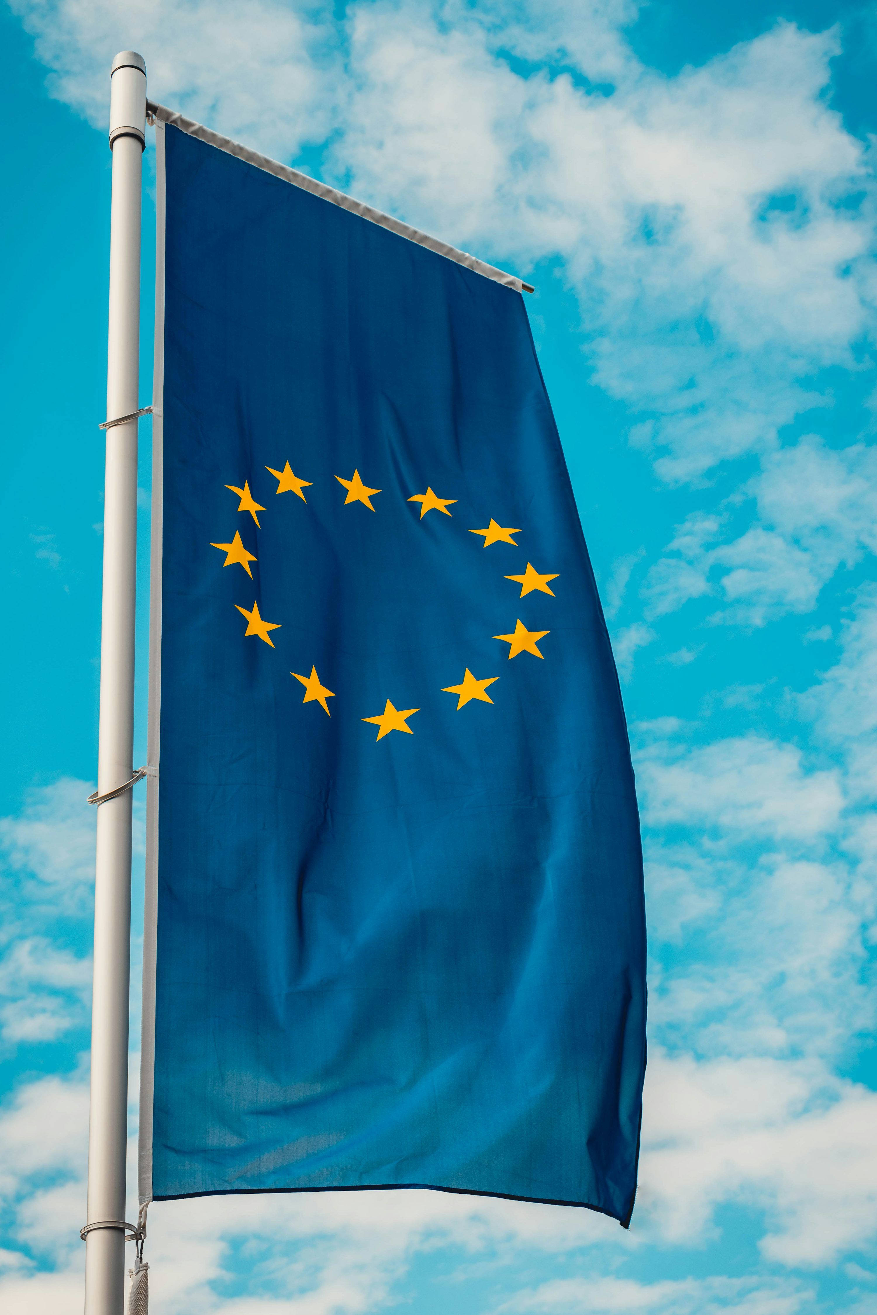 yellow stars flag on pole photo