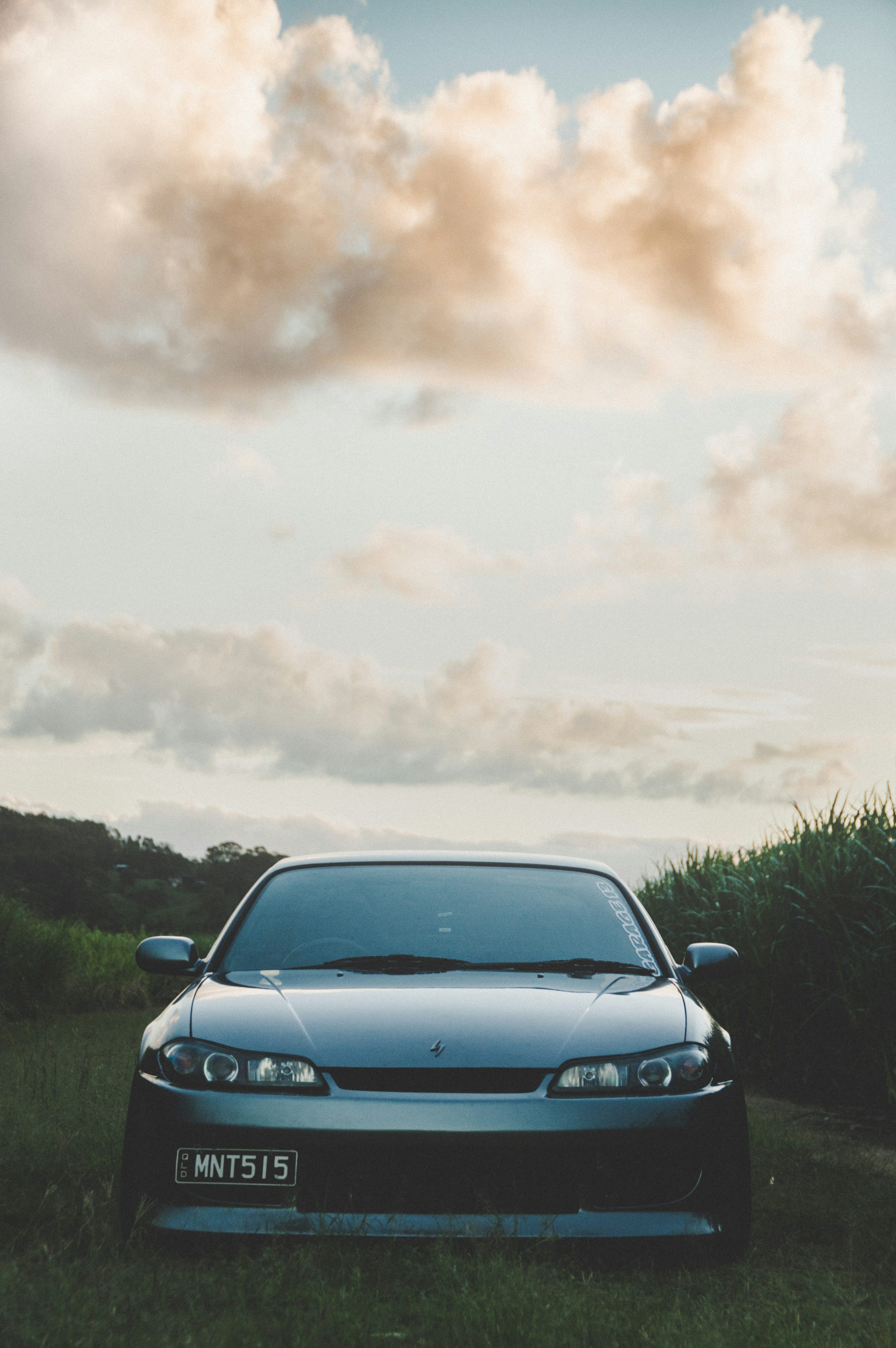 Parked silver Nissan Silvia S15 during