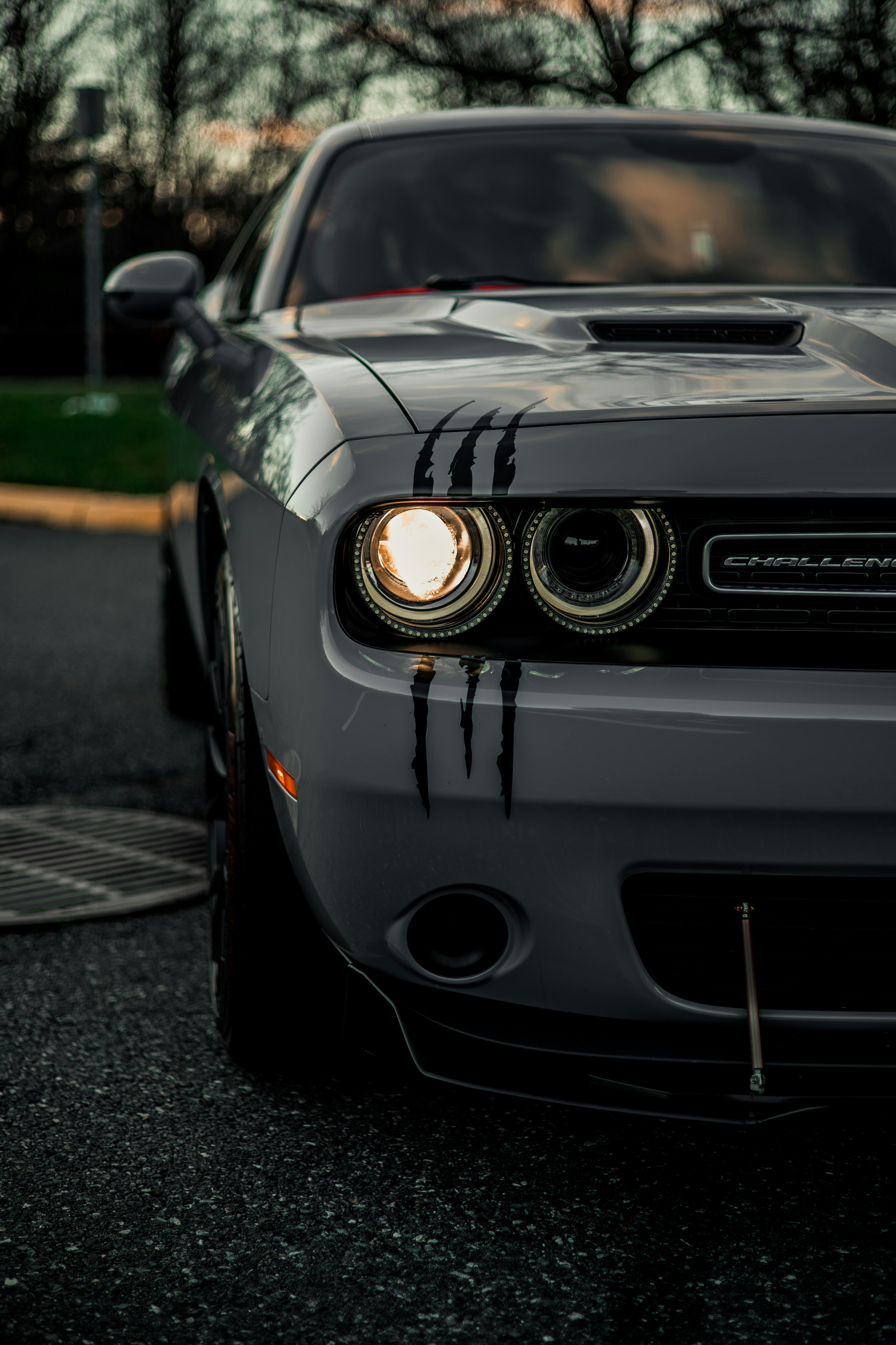 Black Dodge Challenger Parked in a Snow