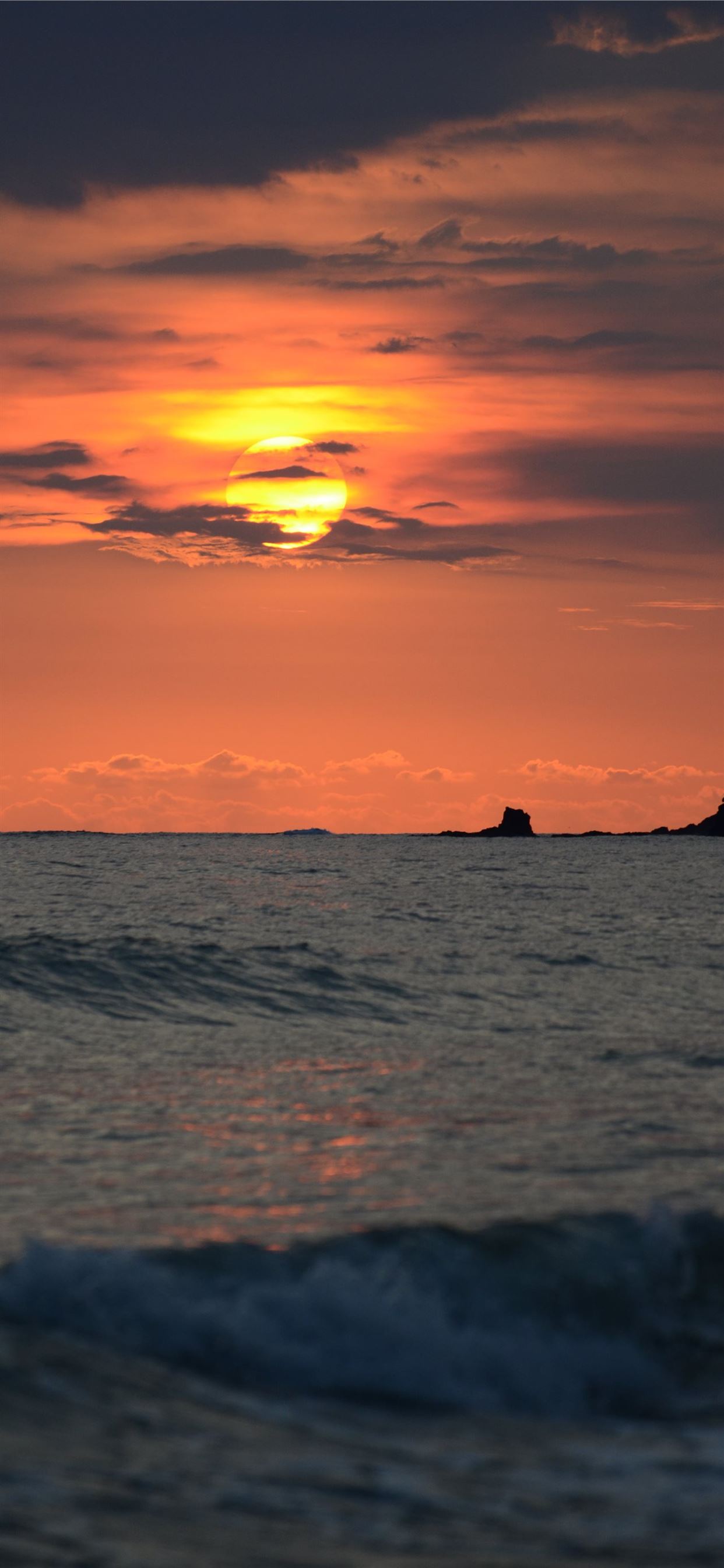 sea water during sunset iPhone X