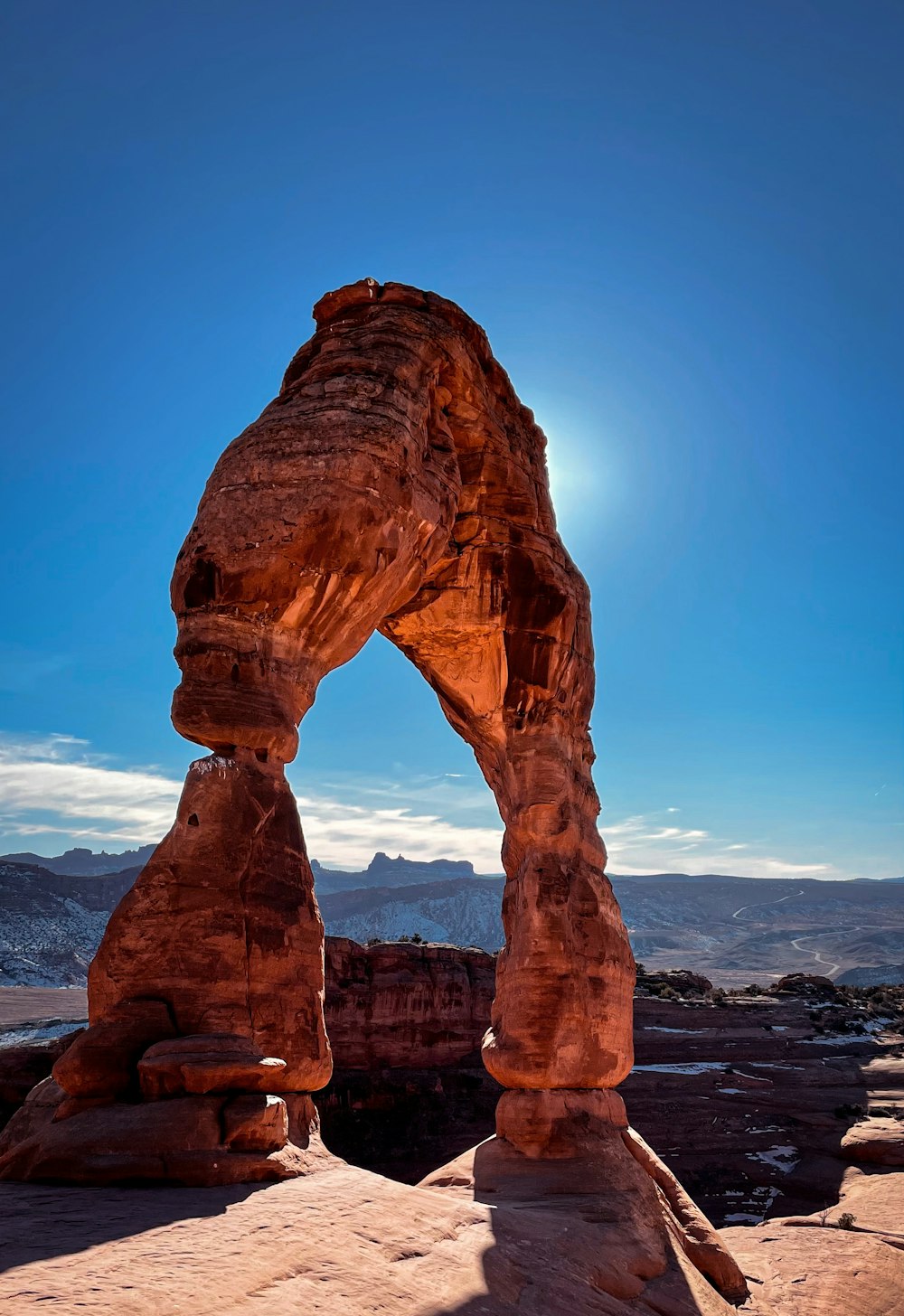 A large rock arch in the middle of a