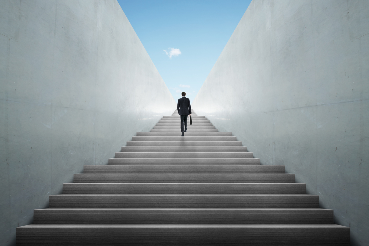 Ambitions concept with businessman